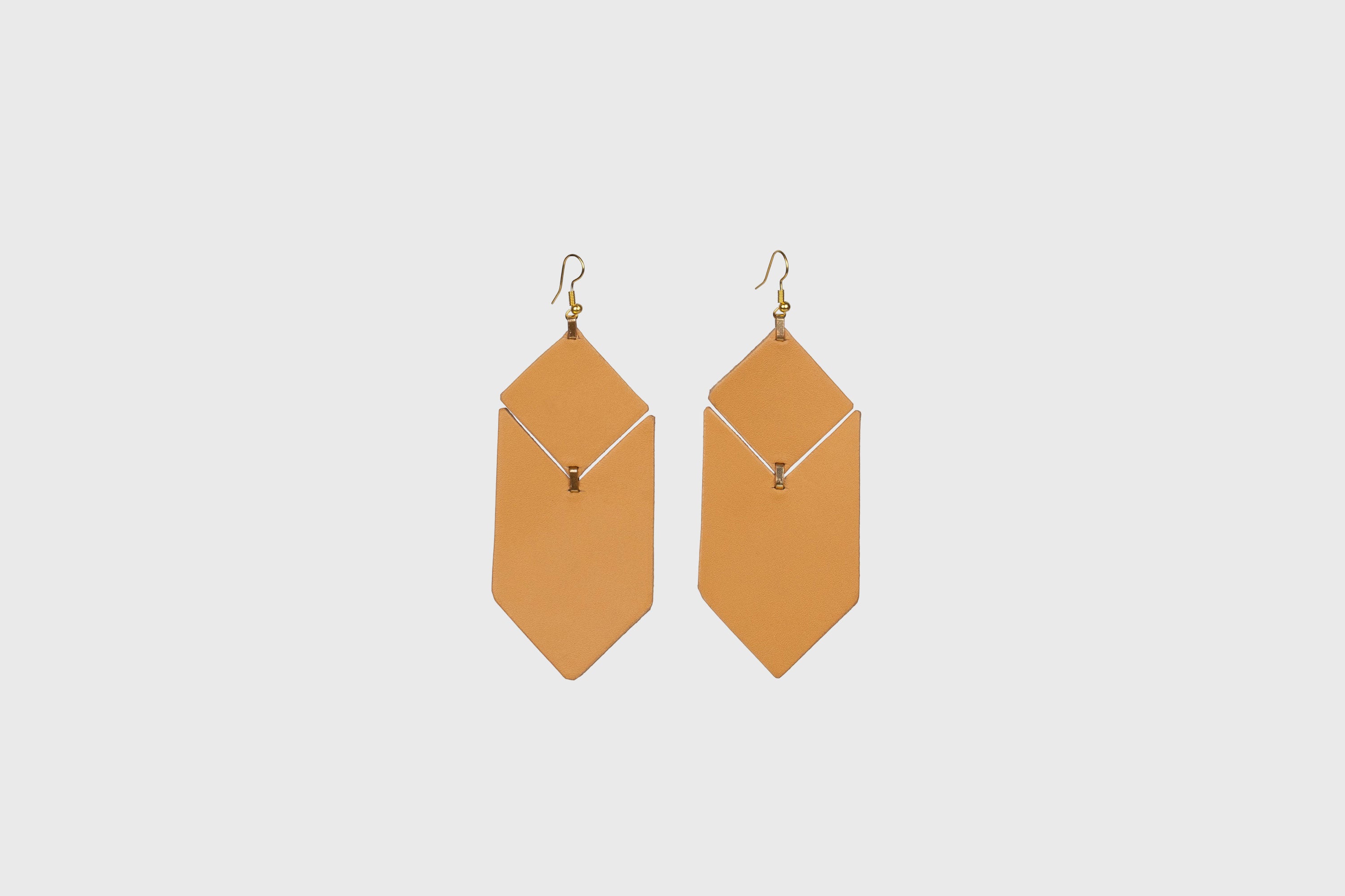 Tess Earrings Leather In Brown Color Vegetable Tanned Leather Minimalistic Design Atelier Madre Manuel Dreesmann Barcelona Spain