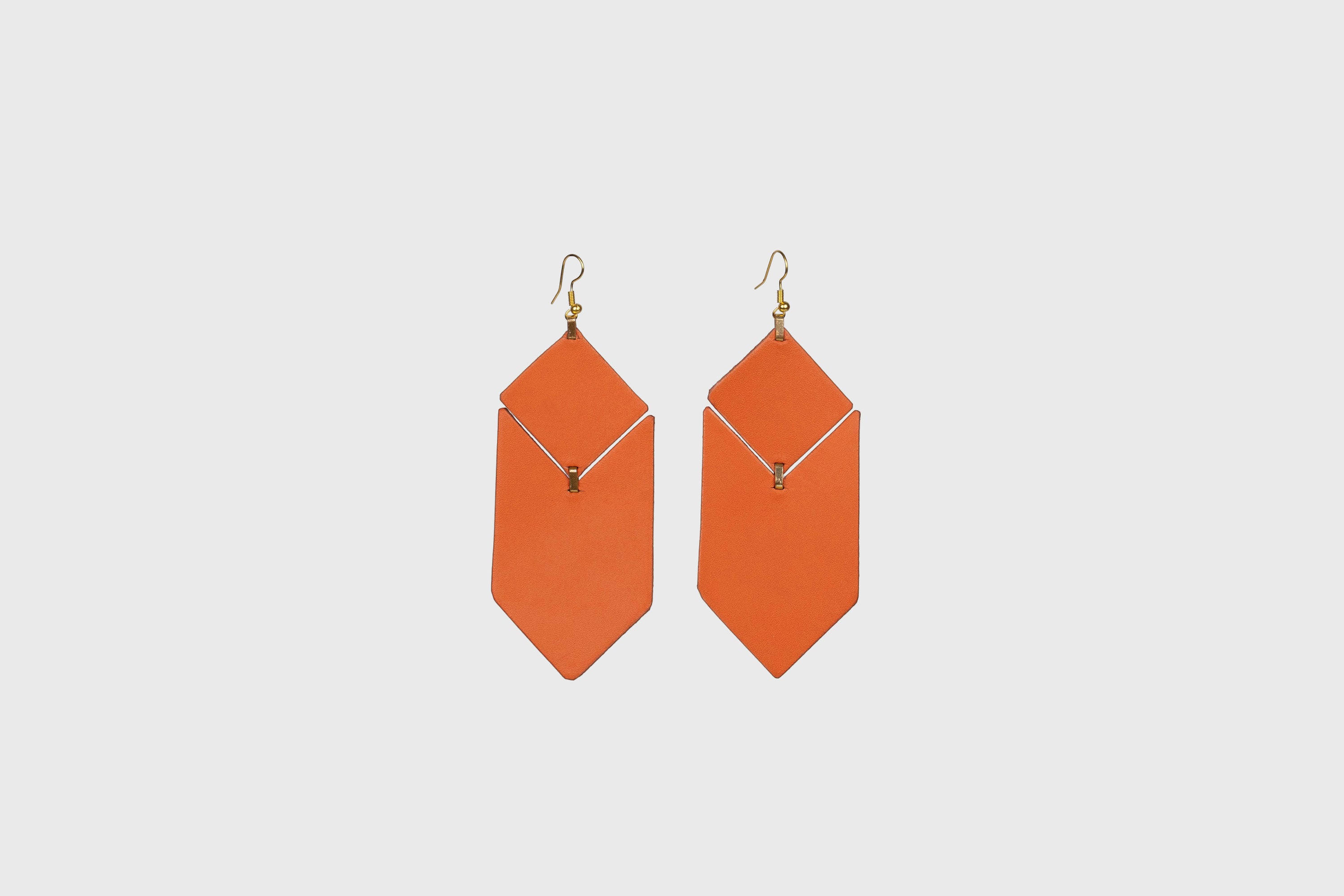 Tess Earrings Leather In Orange Color Vegetable Tanned Leather Minimalistic Design Atelier Madre Manuel Dreesmann Barcelona Spain