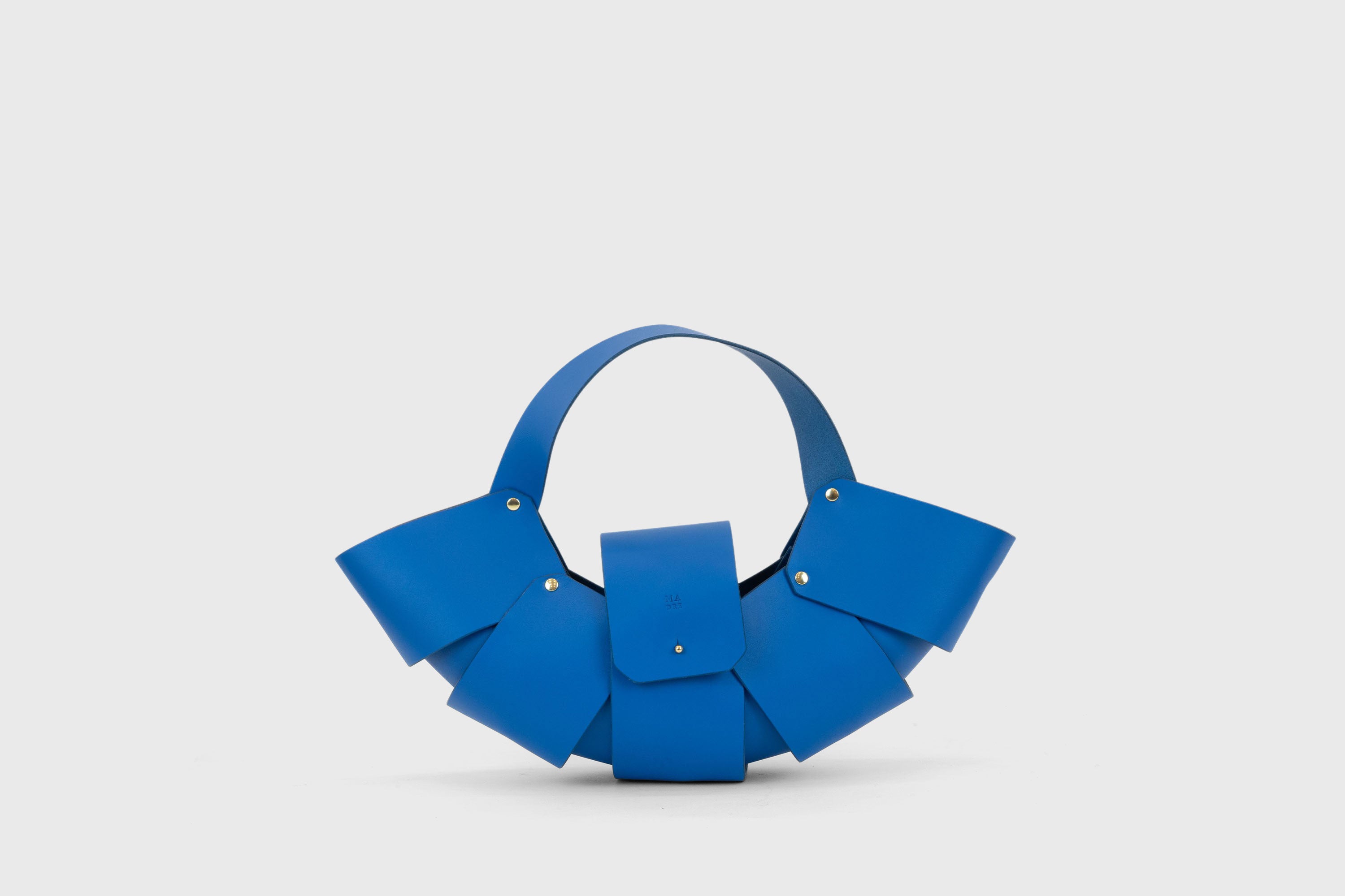 The Croissant Leather Bag Royal Blue Vegetable Tanned Full Grain Premium Spain Brass Rivets Design Minimalist Modern Shopper Handbag Pouch Handbag Atelier Madre Manuel Dreesmann Barcelona