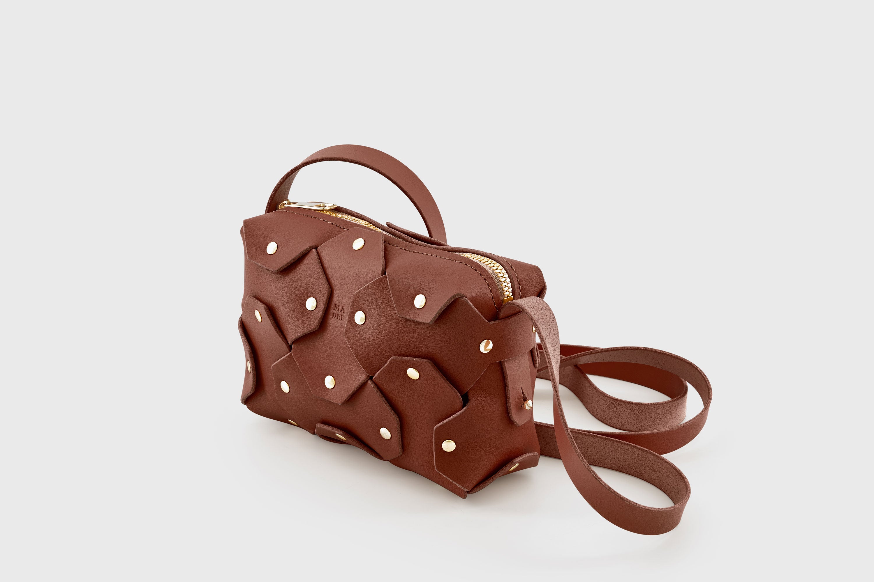 Rivet Bag Small Leather Dark Brown Color Clutch Crossbody Shoulder Detachable Full Brass Vegetable Tanned Full Grain Leather High Quality Modern Minimalistic Design Atelier Madre Manuel Dreesmann Barcelona Spain