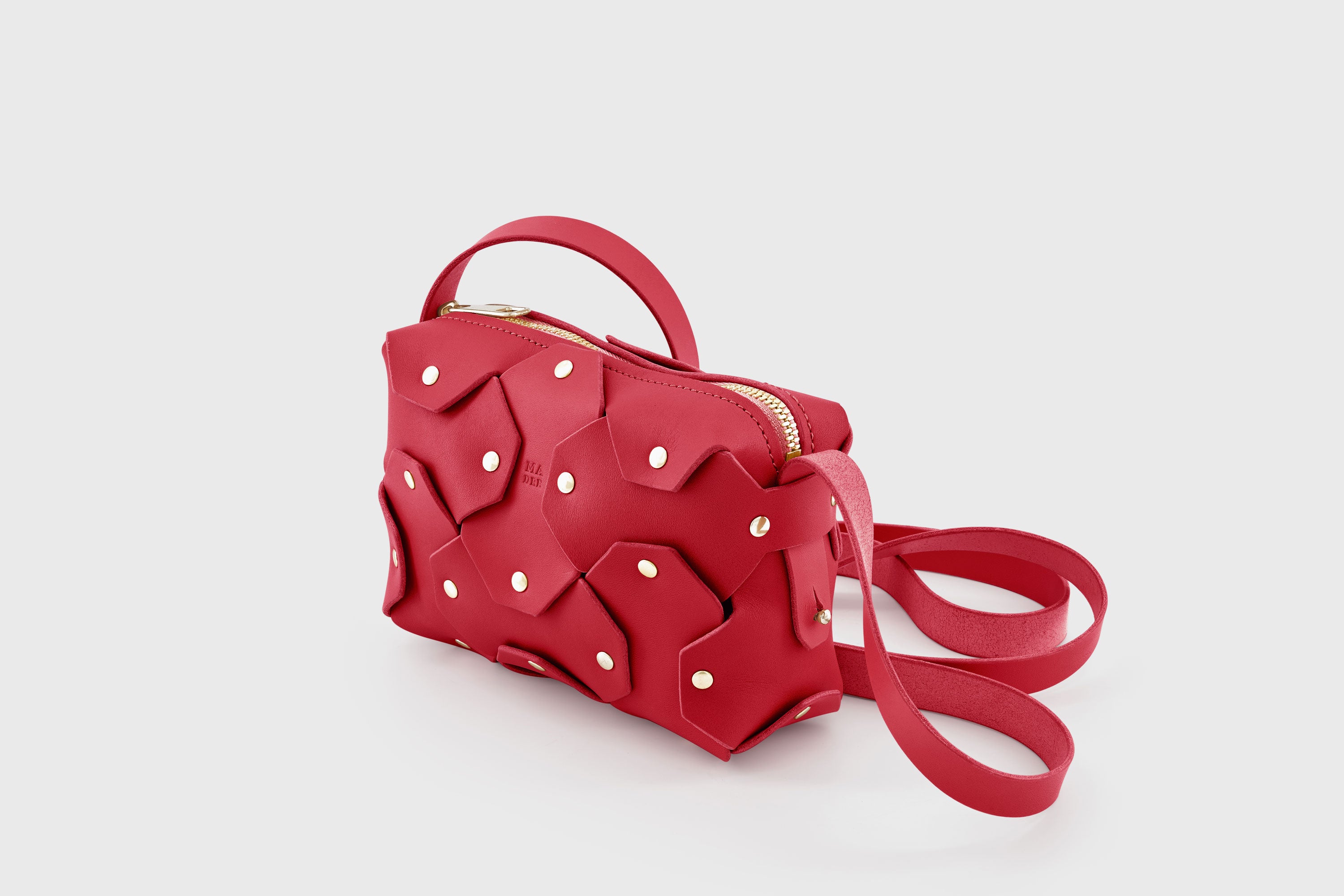 Rivet Bag Small Leather Red Color Clutch Crossbody Shoulder Detachable Full Brass Vegetable Tanned Full Grain Leather High Quality Modern Minimalistic Design Atelier Madre Manuel Dreesmann Barcelona Spain