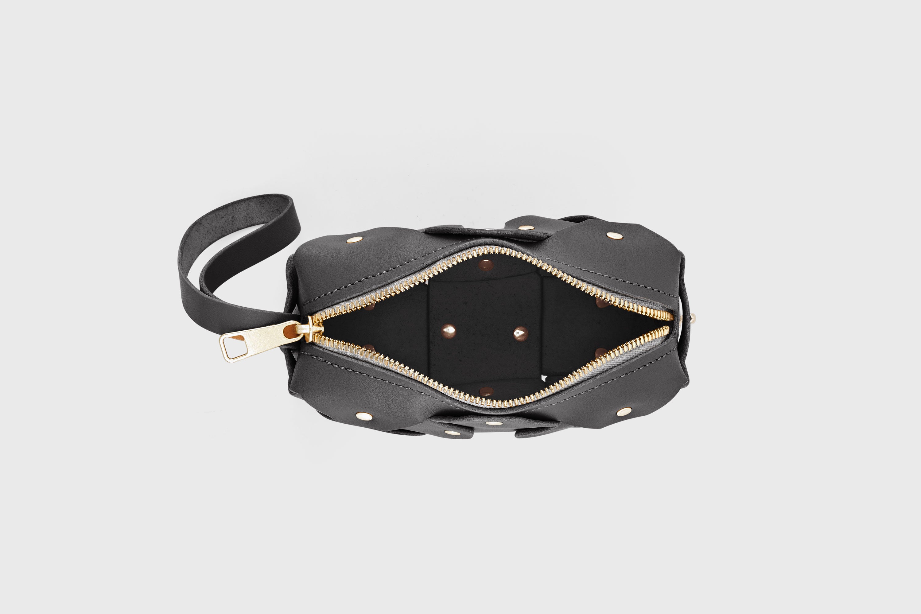 Rivet Bag Small Leather Black Color Clutch Crossbody Shoulder Detachable Full Brass Vegetable Tanned Full Grain Leather High Quality Modern Minimalistic Design Atelier Madre Manuel Dreesmann Barcelona Spain