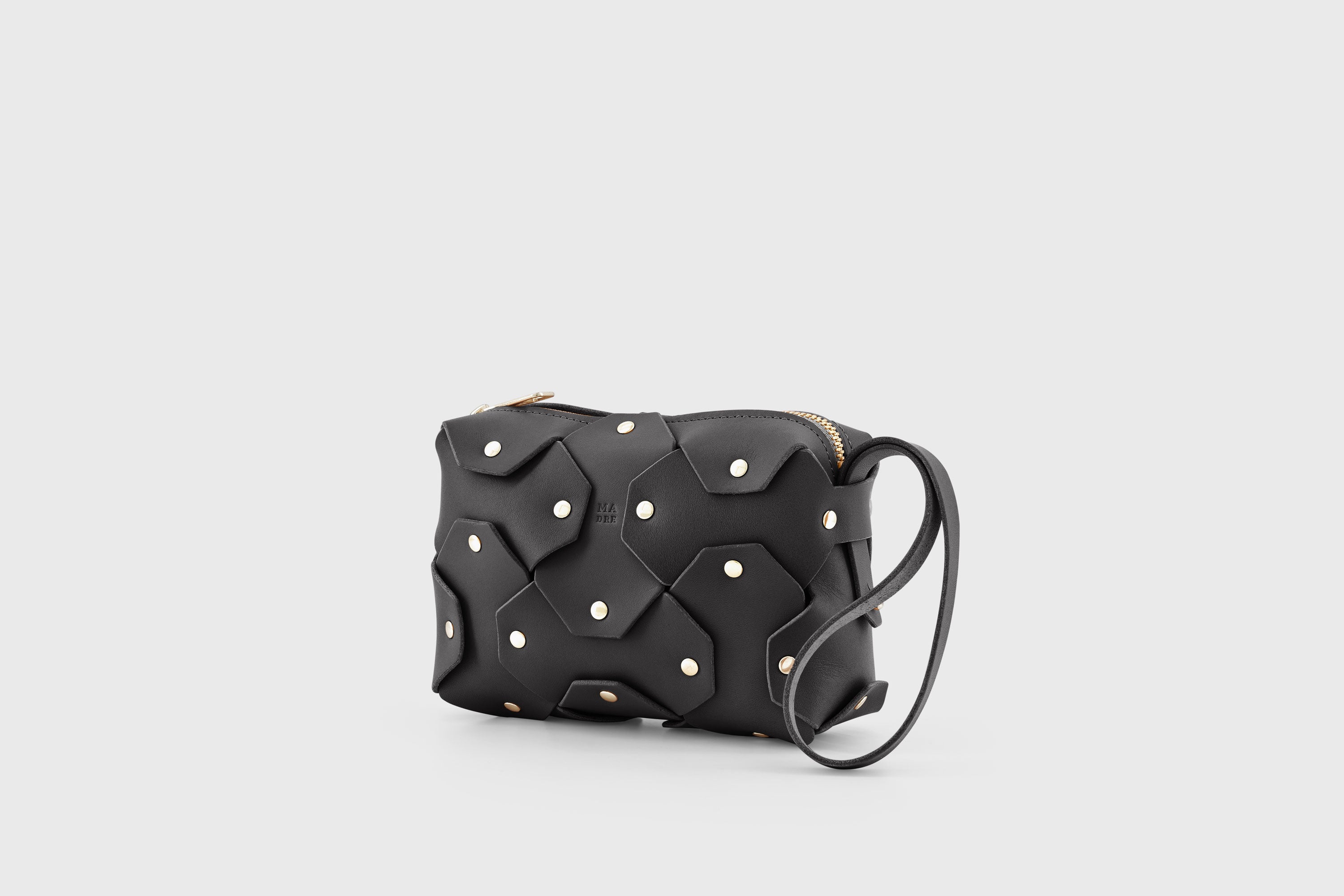 Rivet Bag Small Leather Black Color Clutch Crossbody Shoulder Detachable Full Brass Vegetable Tanned Full Grain Leather High Quality Modern Minimalistic Design Atelier Madre Manuel Dreesmann Barcelona Spain