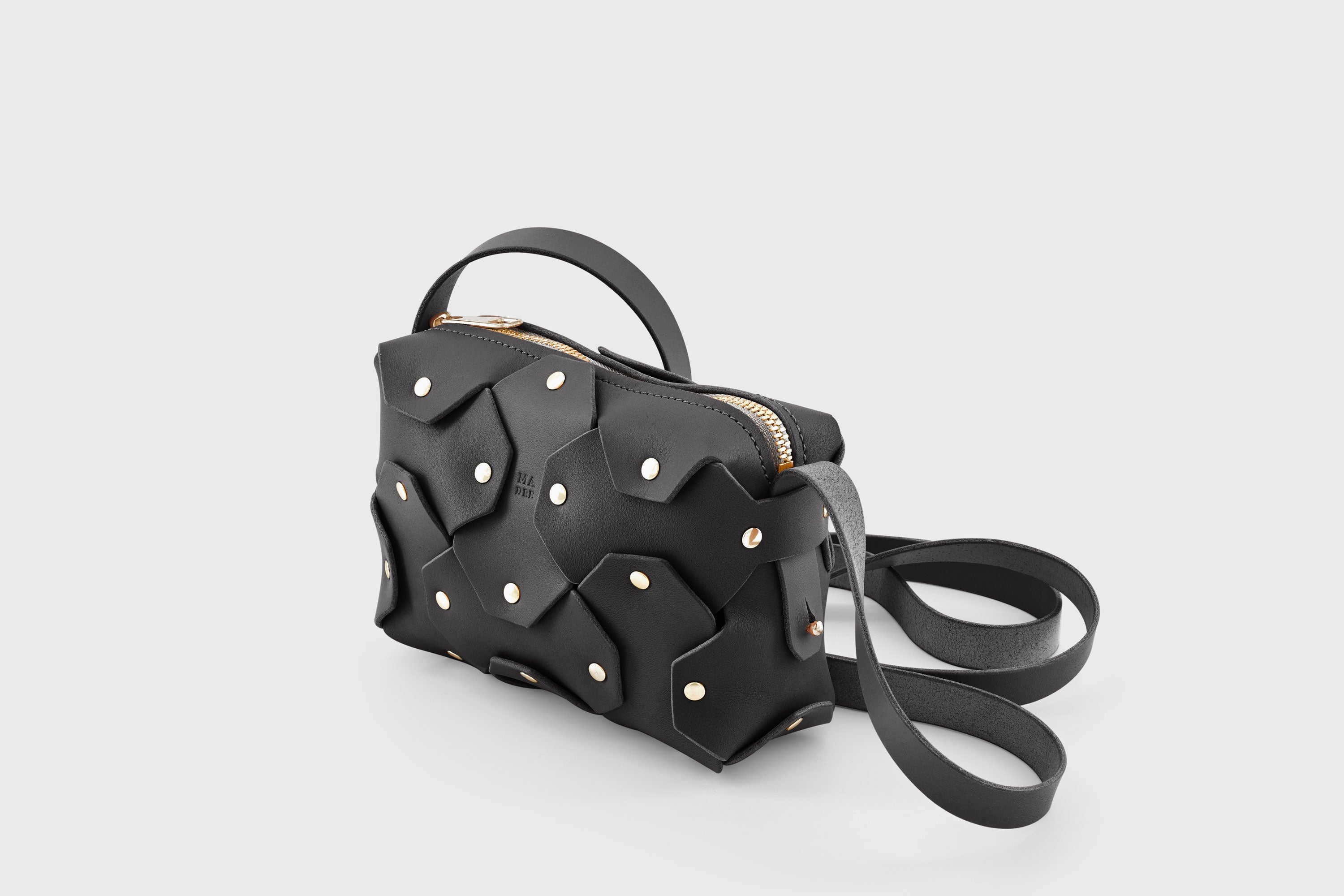 Rivet Bag Small Leather Black Color Clutch Crossbody Shoulder Detachable Full Brass Vegetable Tanned Full Grain Leather High Quality Modern Minimalistic Design Atelier Madre Manuel Dreesmann Barcelona Spain
