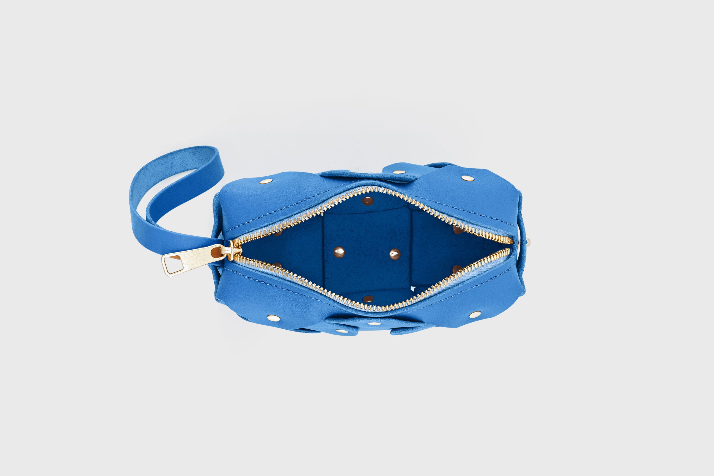 Rivet Bag Small Leather Royal Blue Color Clutch Crossbody Shoulder Detachable Full Brass Vegetable Tanned Full Grain Leather High Quality Modern Minimalistic Design Atelier Madre Manuel Dreesmann Barcelona Spain