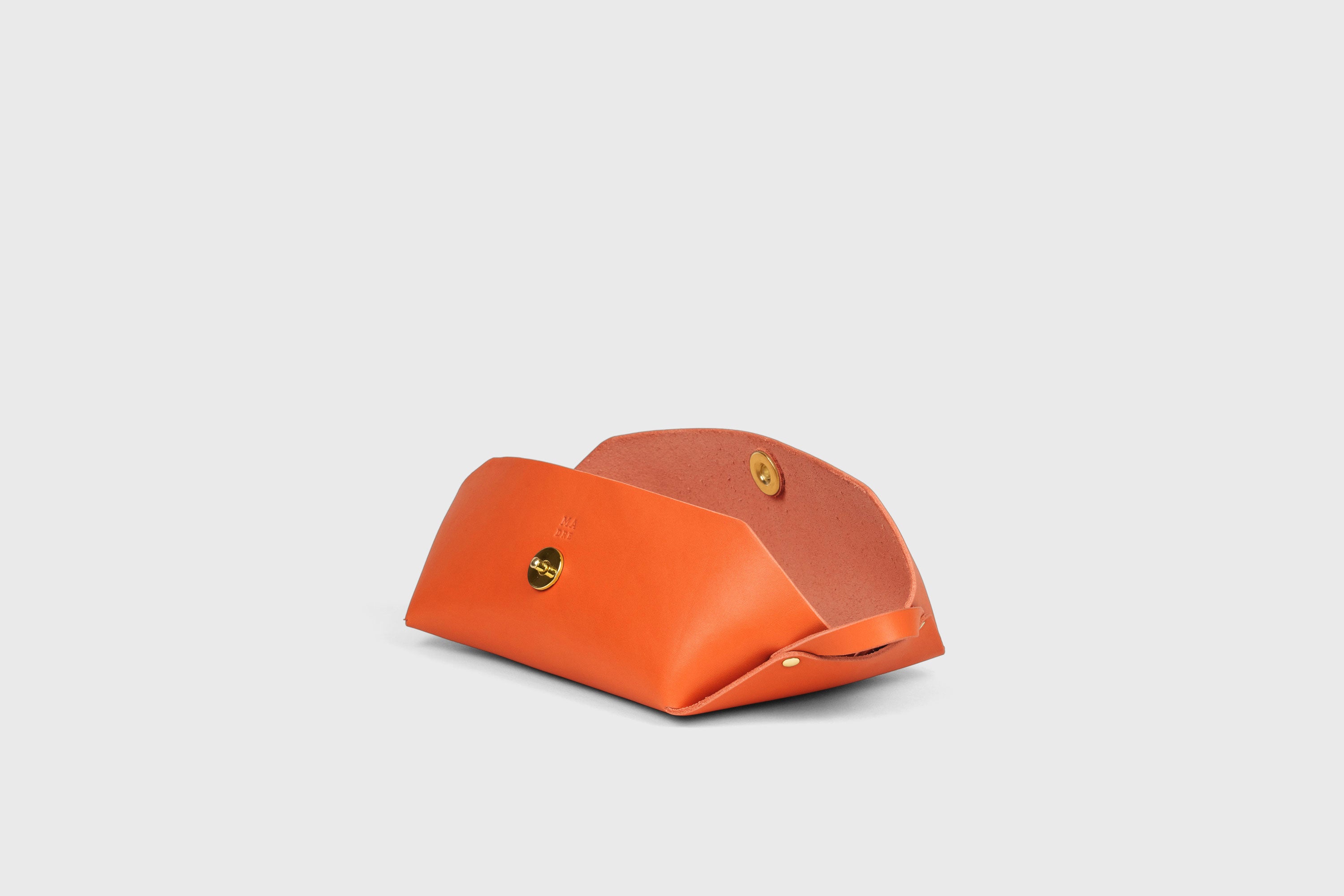 Cosmetic and Toiletry Bag Orange Color Leather Dopp Kit Mens Woman's Pouch Makeup Case Minimalistic Modern Design Atelier Madre Manuel Dreesmann Barcelona Spain