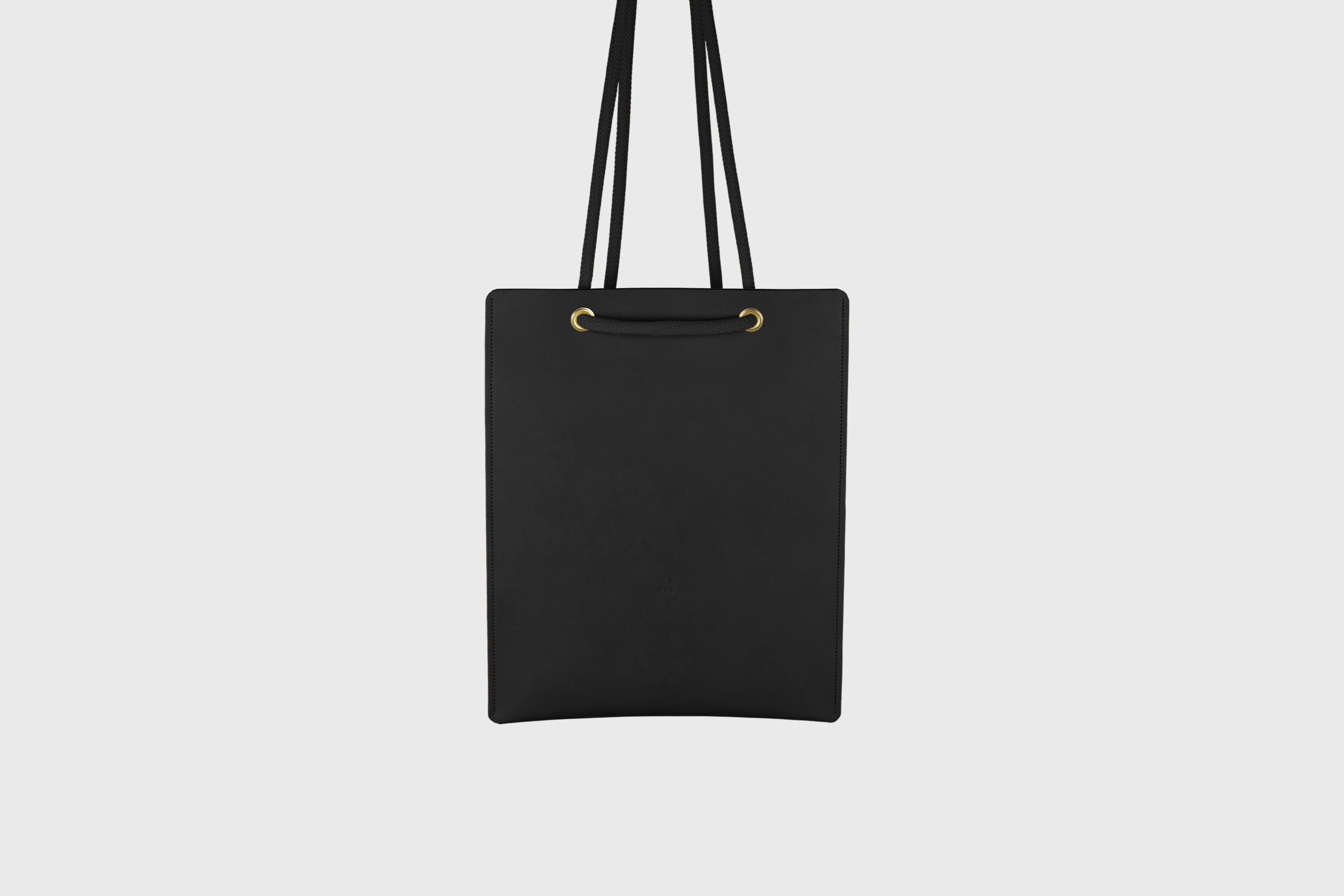 Tote Backpack Premium Leather Black Color Rope Handles Minimalist Design Atelier Madre Manuel Dreesmann Barcelona Spain