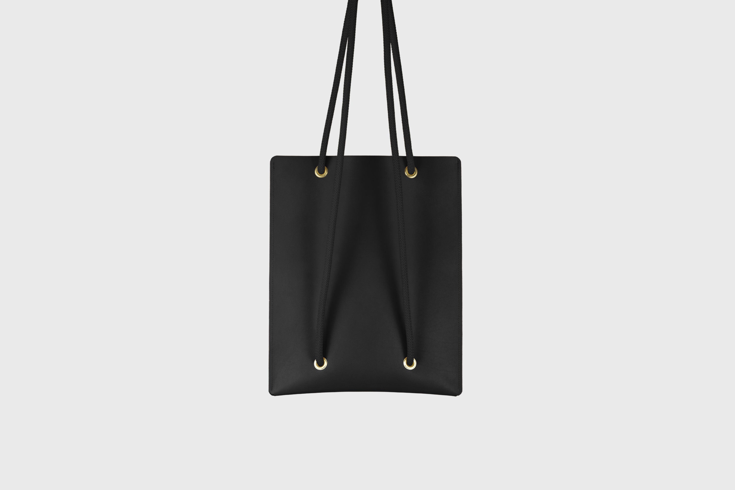 Tote Backpack Premium Leather Black Color Rope Handles Minimalist Design Atelier Madre Manuel Dreesmann Barcelona Spain