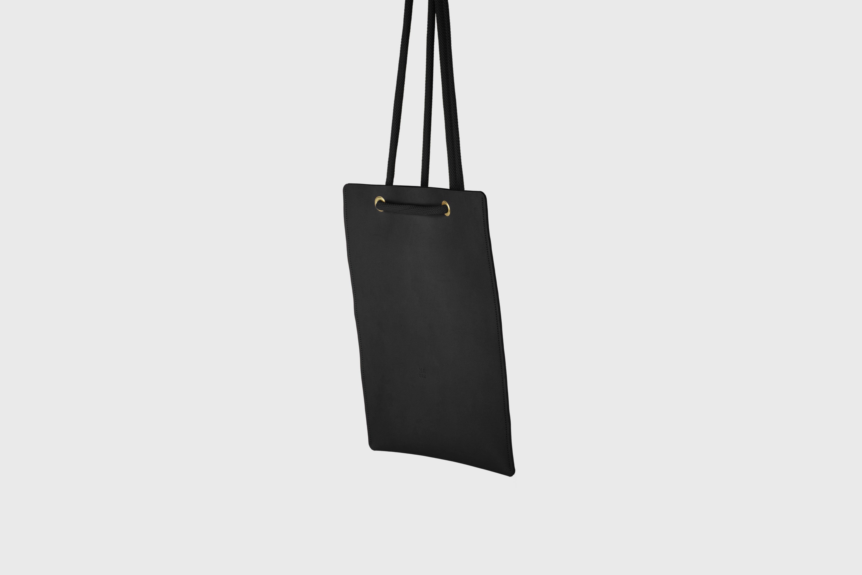 Tote Backpack Premium Leather Black Color Rope Handles Minimalist Design Atelier Madre Manuel Dreesmann Barcelona Spain
