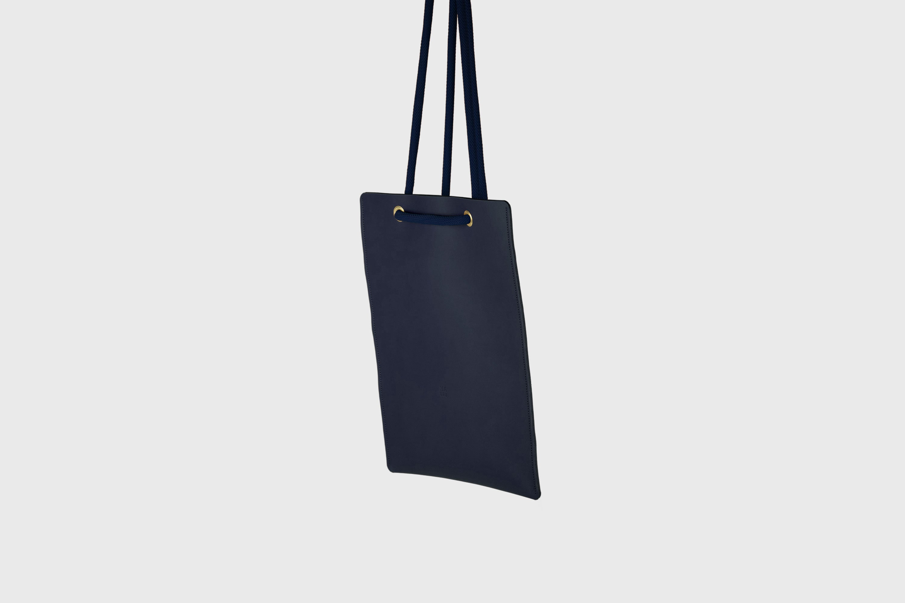 Tote Backpack Premium Leather Marine Blue Color Rope Handles Minimalist Design Atelier Madre Manuel Dreesmann Barcelona Spain