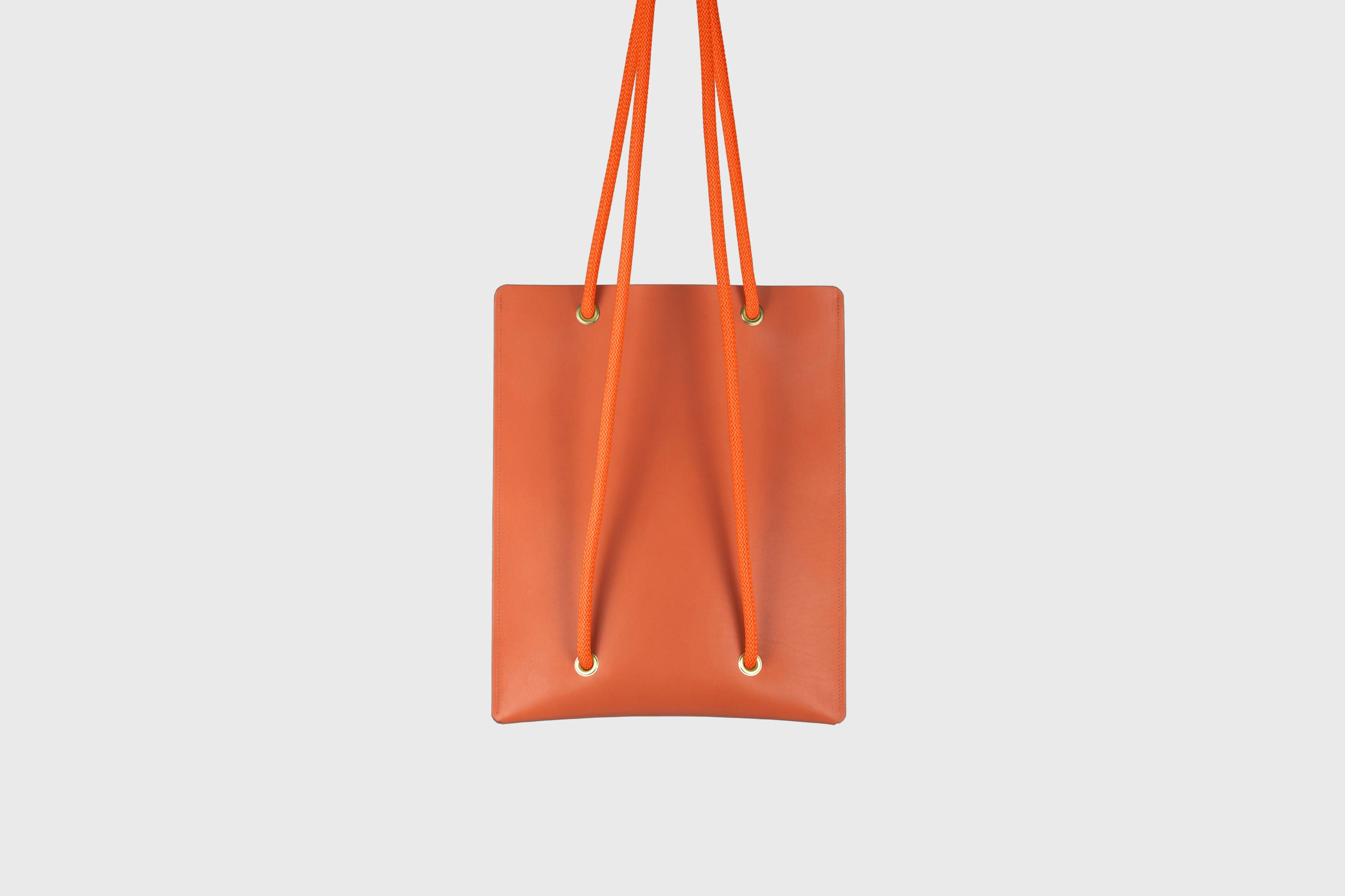 Tote Backpack Premium Leather Orange Color Rope Handles Minimalist Design Atelier Madre Manuel Dreesmann Barcelona Spain