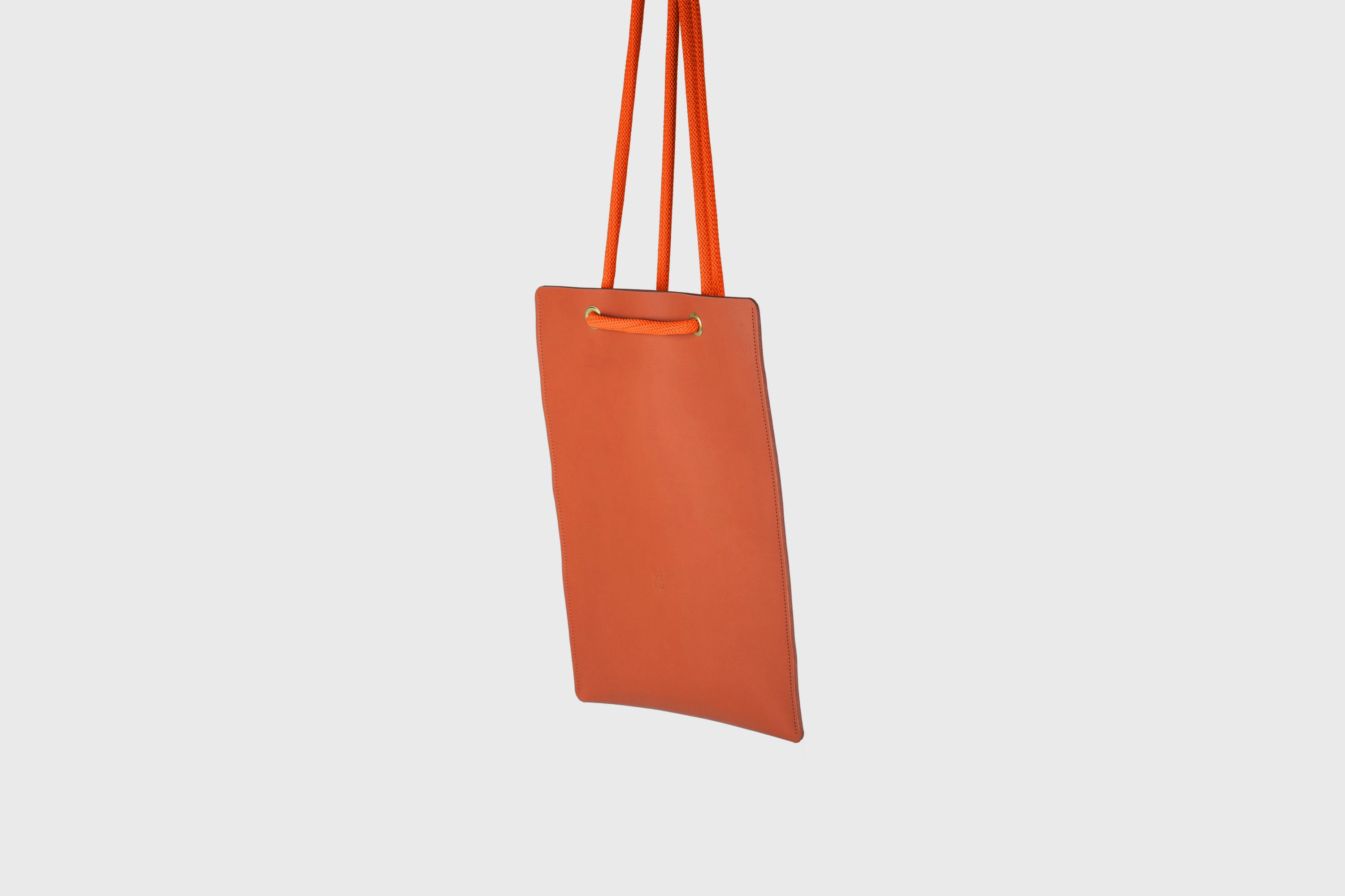 Tote Backpack Premium Leather Orange Color Rope Handles Minimalist Design Atelier Madre Manuel Dreesmann Barcelona Spain
