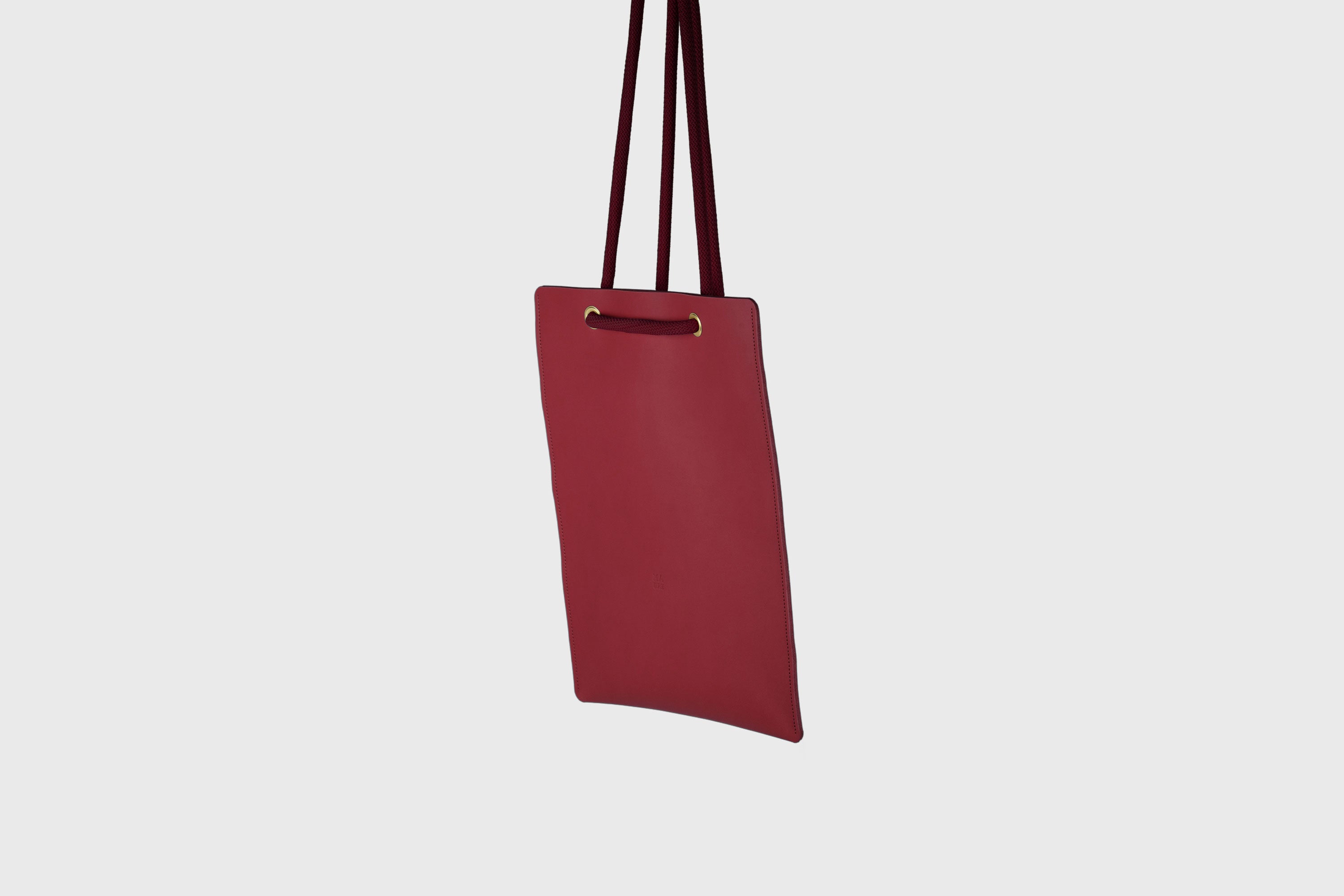 Tote Backpack Premium Leather Red Color Rope Handles Minimalist Design Atelier Madre Manuel Dreesmann Barcelona Spain