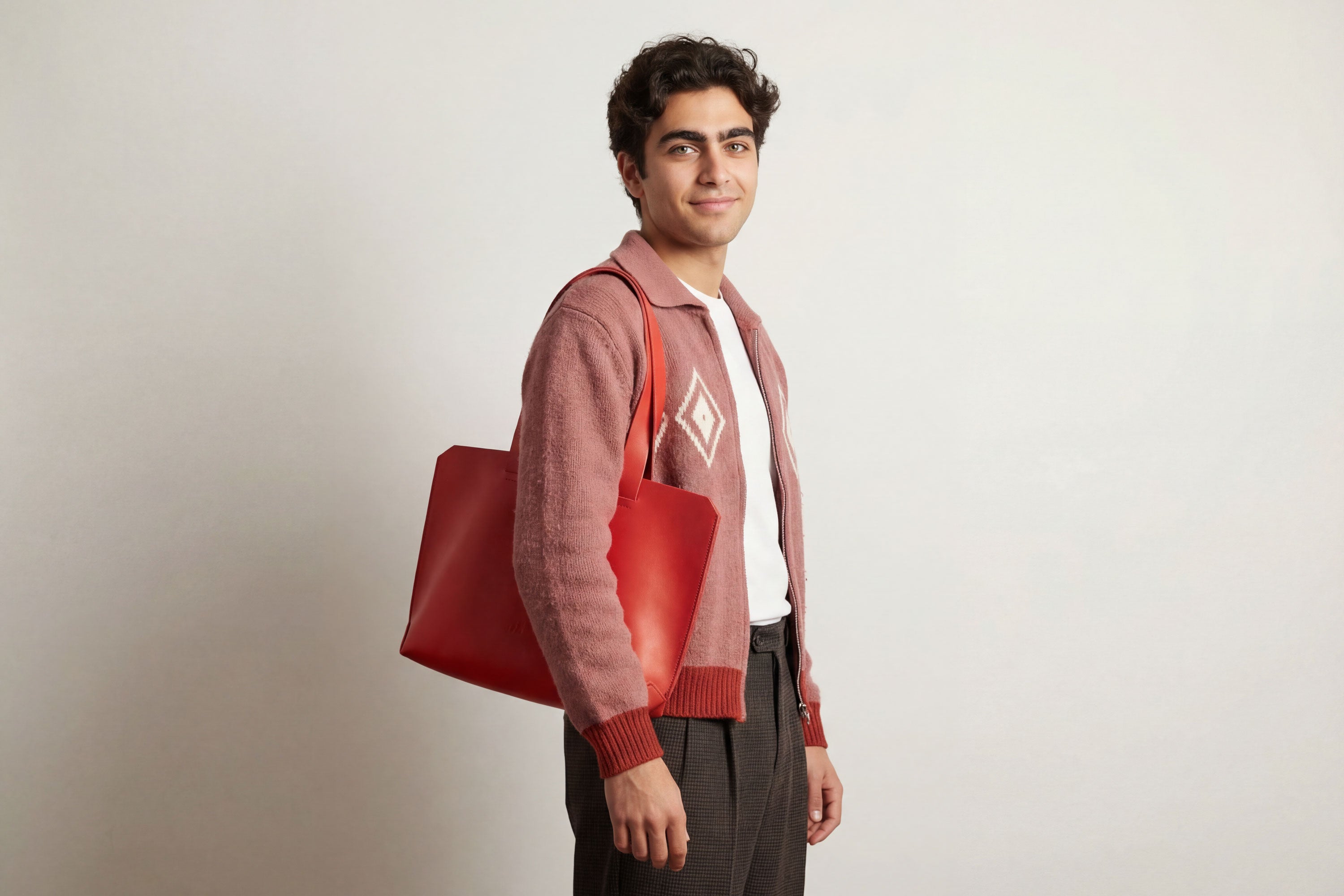 Tote Bag Leather Red Color Vegetable On A Man Model Tanned Leather Natural Minimalistic Design By Manuel Dreesmann Atelier Madre Barcelona Spain