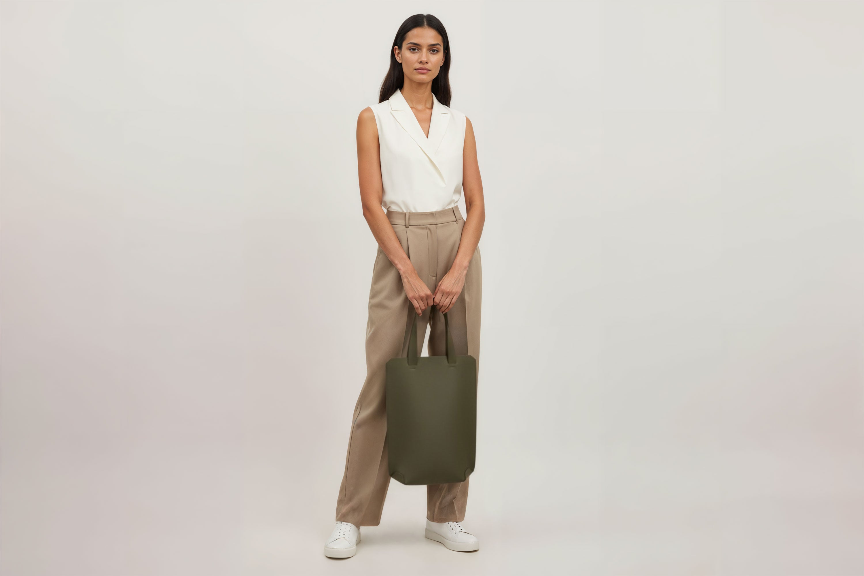 Tote Bag Long Olive Green Color Leather Bag On A Woman Model Vegetable Tanned Leather Exclusive Quality Craftsmanship Handmade Design By Manuel Dreesmann Atelier Madre Barcelona Spain