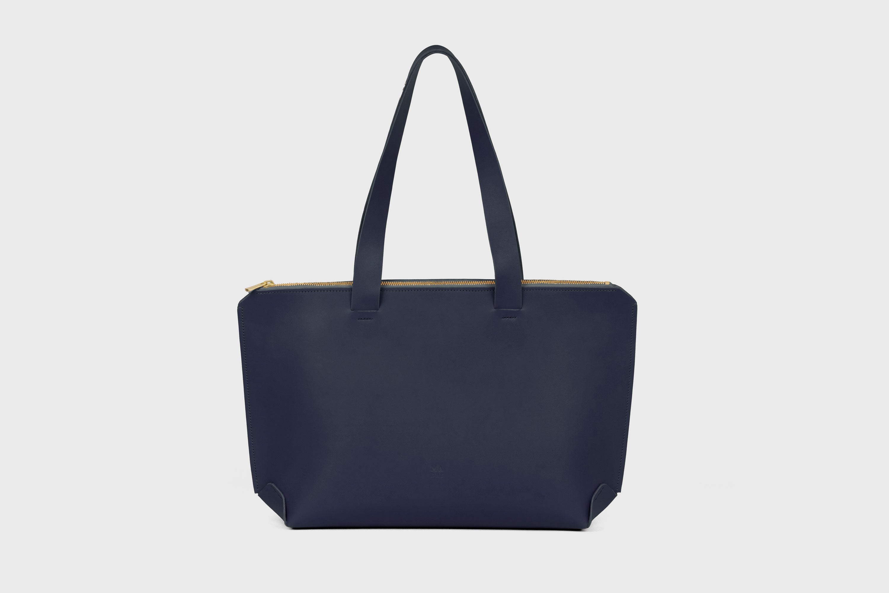 Tote Bag With Zipper In Marine Blue Colour In Vegetable Tanned Leather Minimalistic Design Atelier Madre Manuel Dreesmann Barcelona Spain