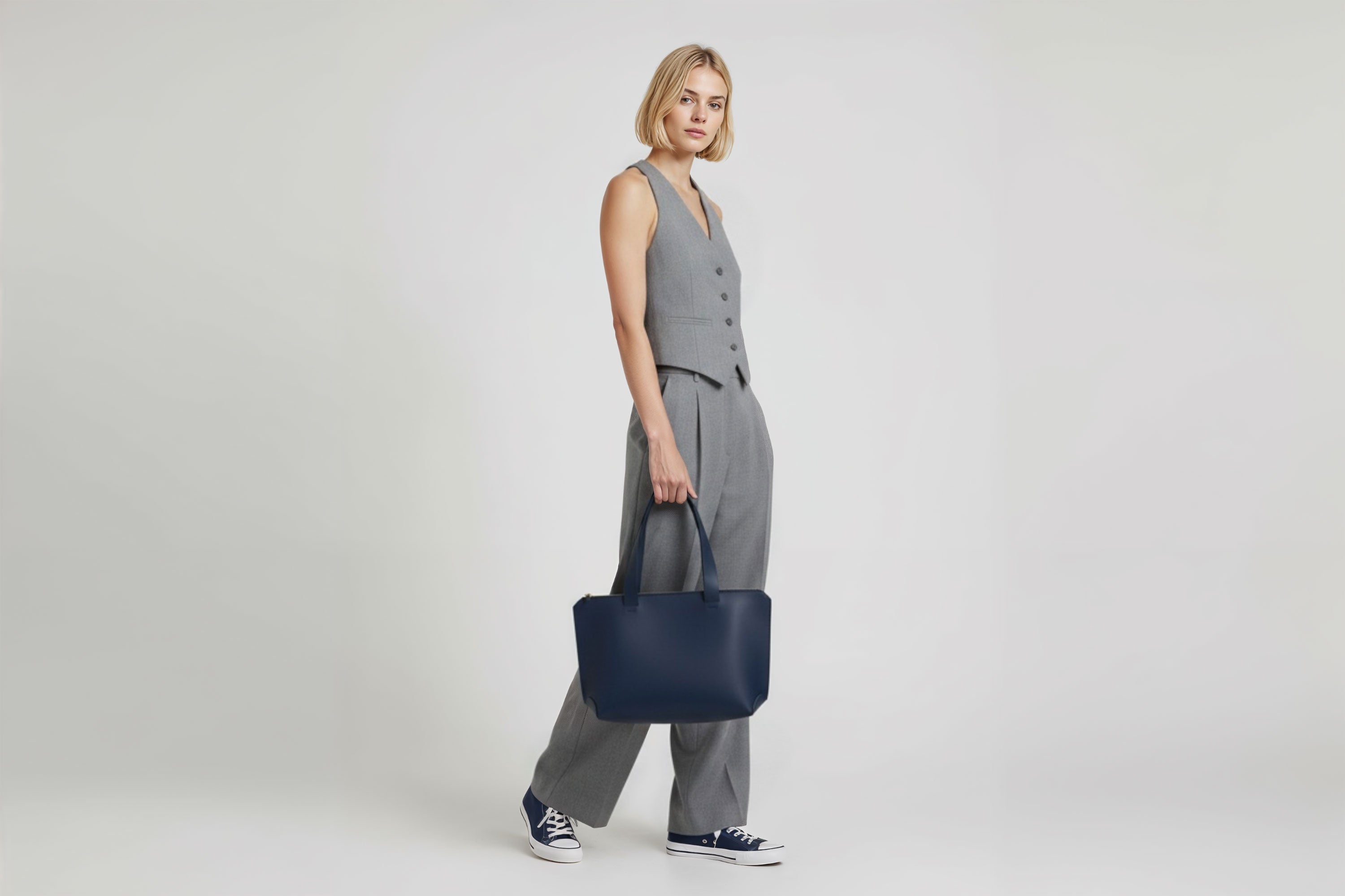 Tote Bag Leather Zipper Orange Color On A Woman Model Premium Quality Minimalist Design Atelier Madre Manuel Dreesmann Barcelona Spain