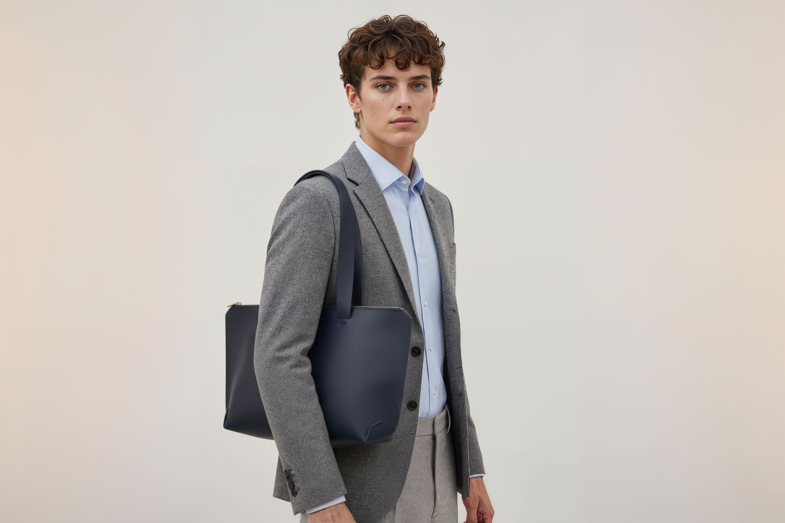 Tote Bag Leather Zipper Orange Color On A Man Model Premium Quality Minimalist Design Atelier Madre Manuel Dreesmann Barcelona Spain