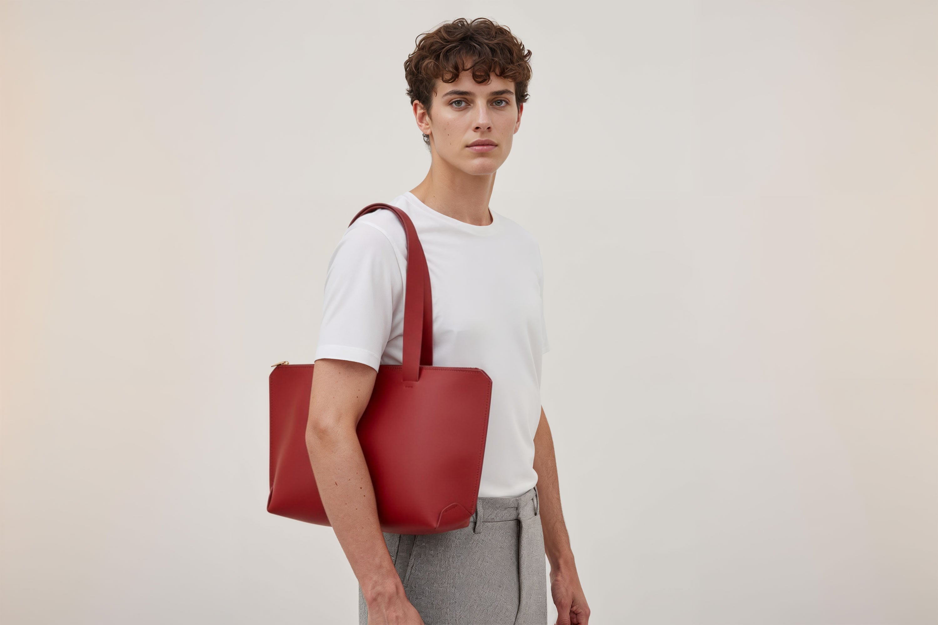 Tote Bag Leather Zipper Red Color On A Man Model Premium Quality Minimalist Design Atelier Madre Manuel Dreesmann Barcelona Spain