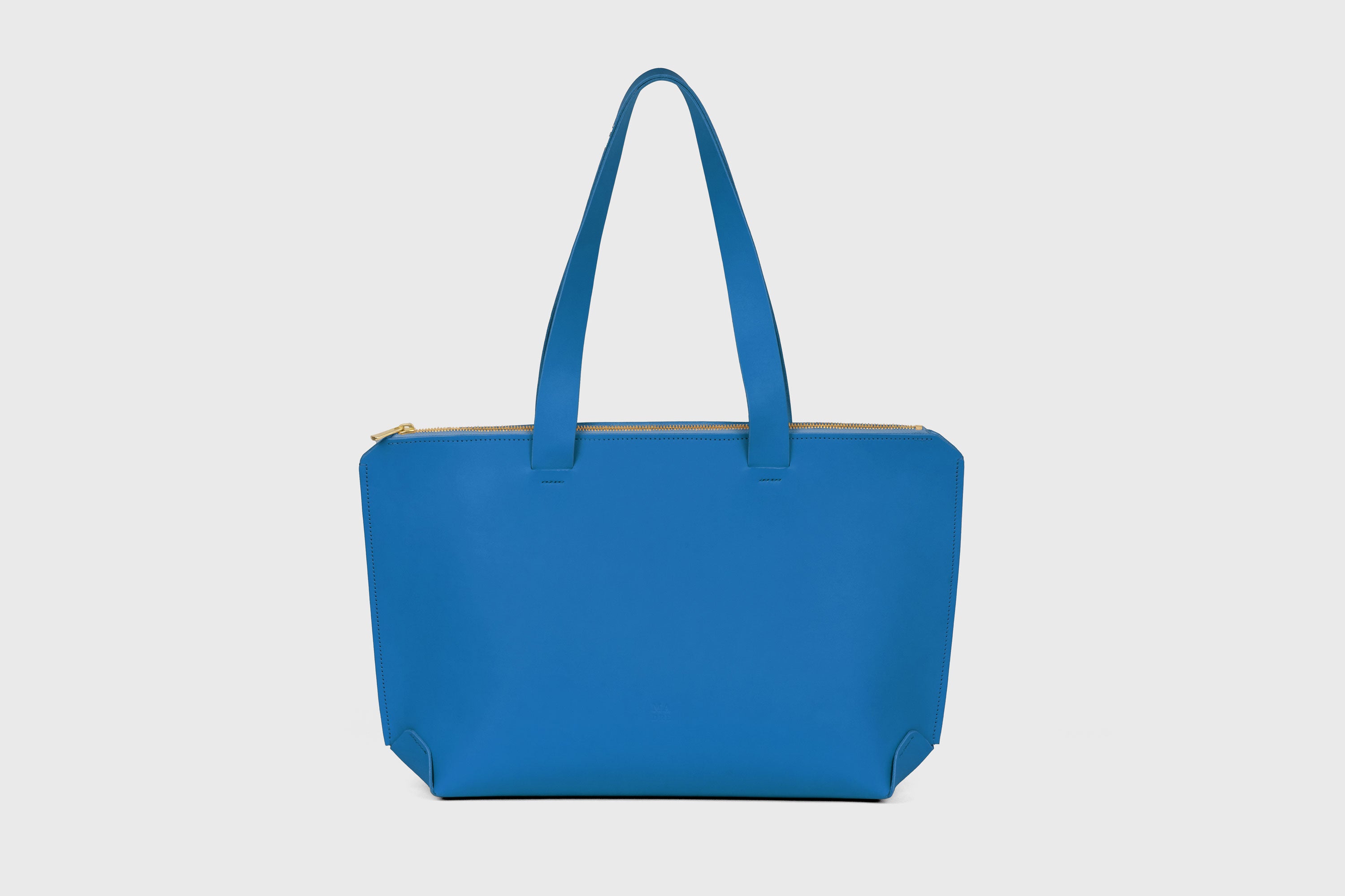 Tote Bag With Zipper In Royal Blue Colour In Vegetable Tanned Leather Minimalistic Design Atelier Madre Manuel Dreesmann Barcelona Spain
