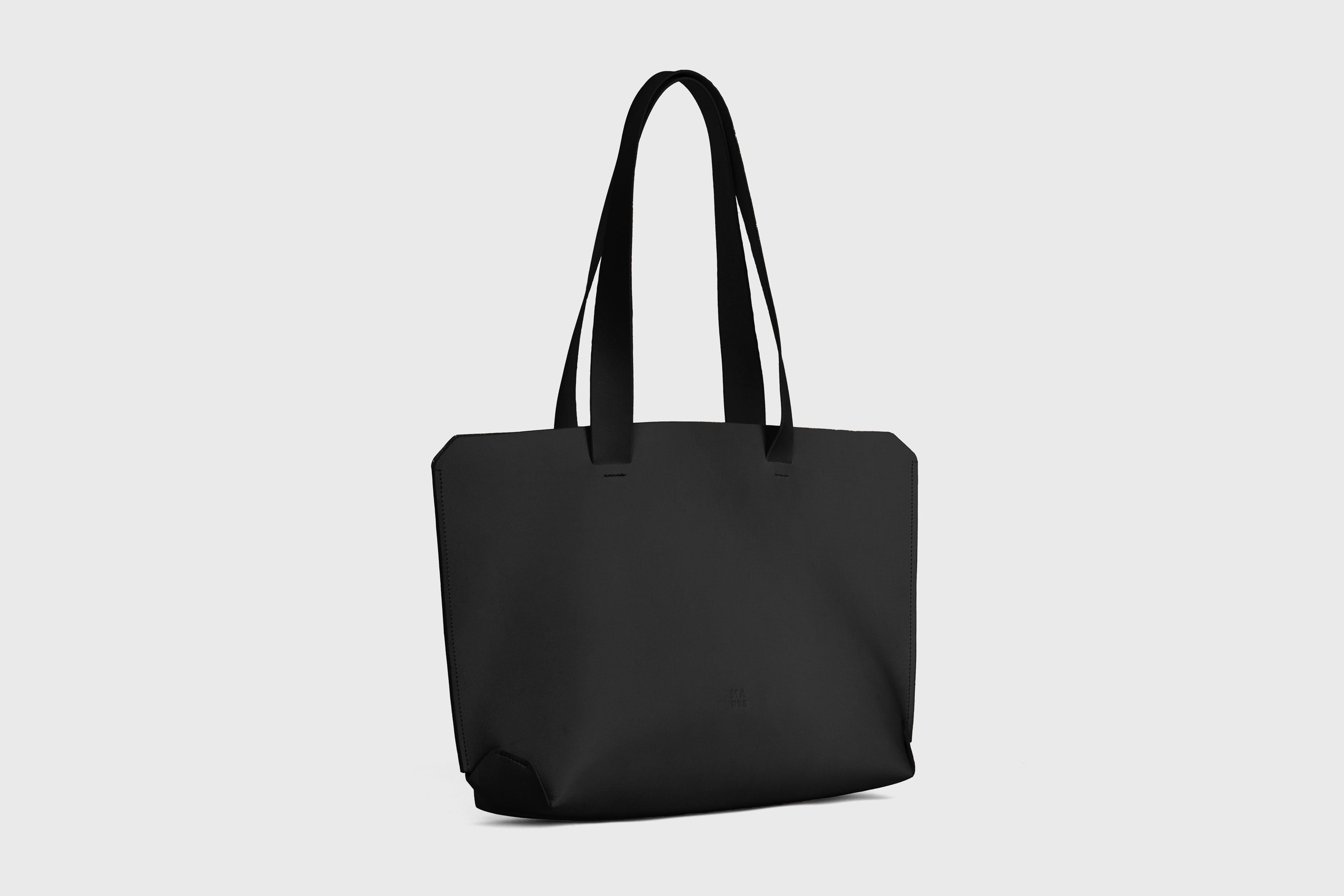 Tote H Bag In Black Color In Vegetable Tanned Leather Minimalistic Design Open Top Atelier Madre Manuel Dreesmann Barcelona Spain