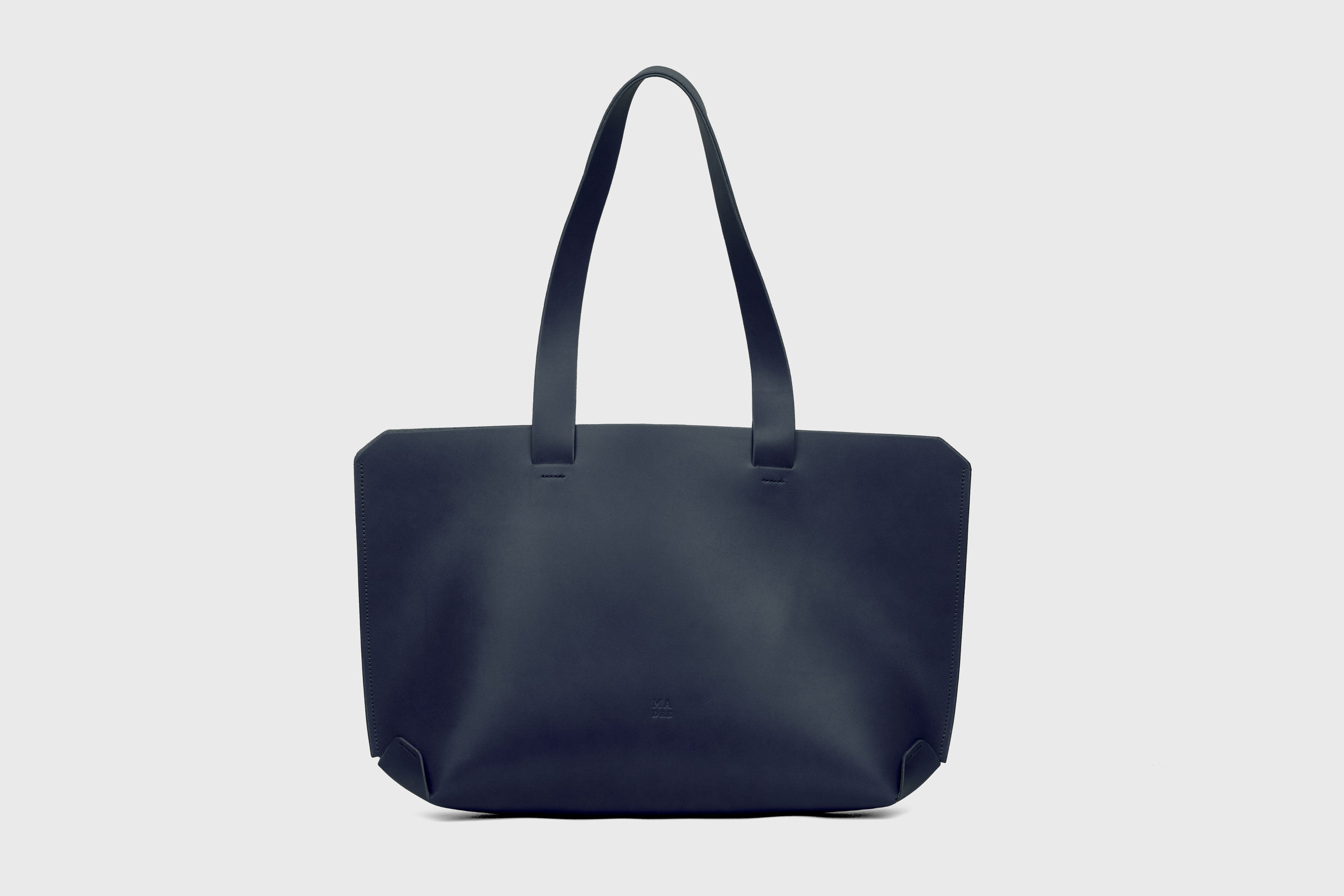 Tote H Bag In Marine Blue Color In Vegetable Tanned Leather Minimalistic Design Open Top Atelier Madre Manuel Dreesmann Barcelona Spain