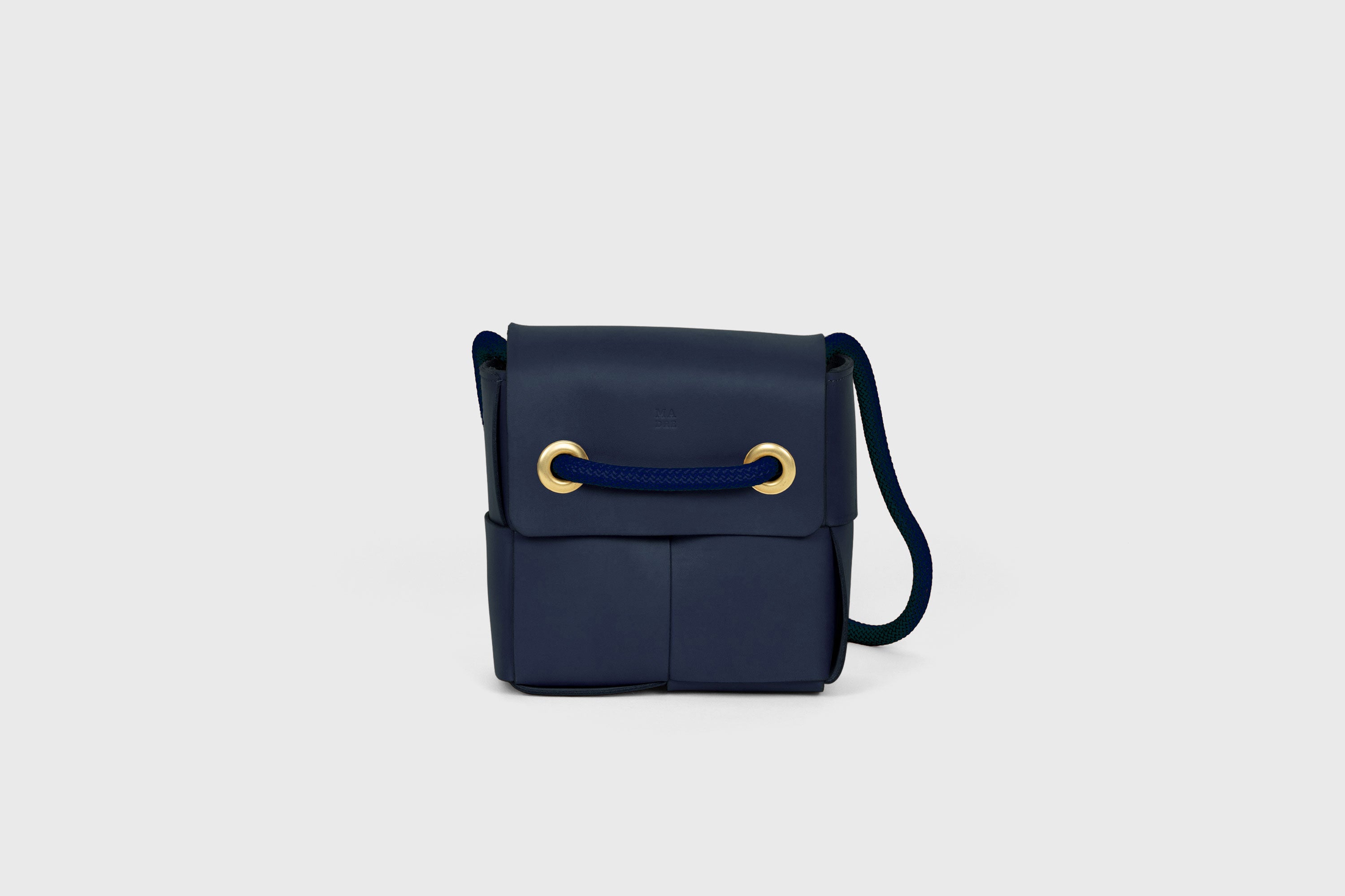 Elegant Atelier Madre Marine Blue Color woven leather backpack, designed by Manuel Dreesmann, showcasing exquisite craftsmanship and luxury style, crafted in the heart of Barcelona.