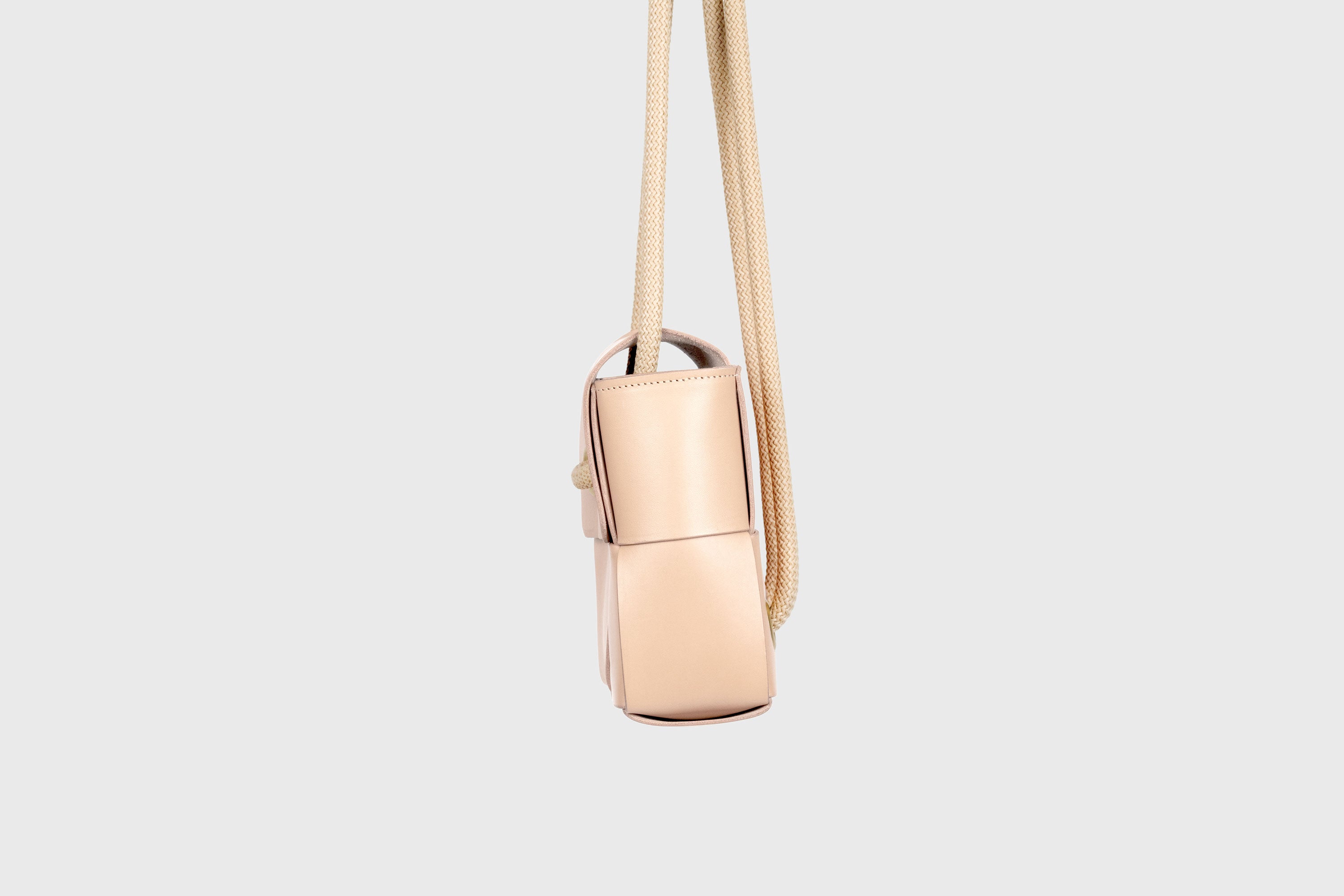 Elegant Atelier Madre Natural Color woven leather backpack, designed by Manuel Dreesmann, showcasing exquisite craftsmanship and luxury style, crafted in the heart of Barcelona.