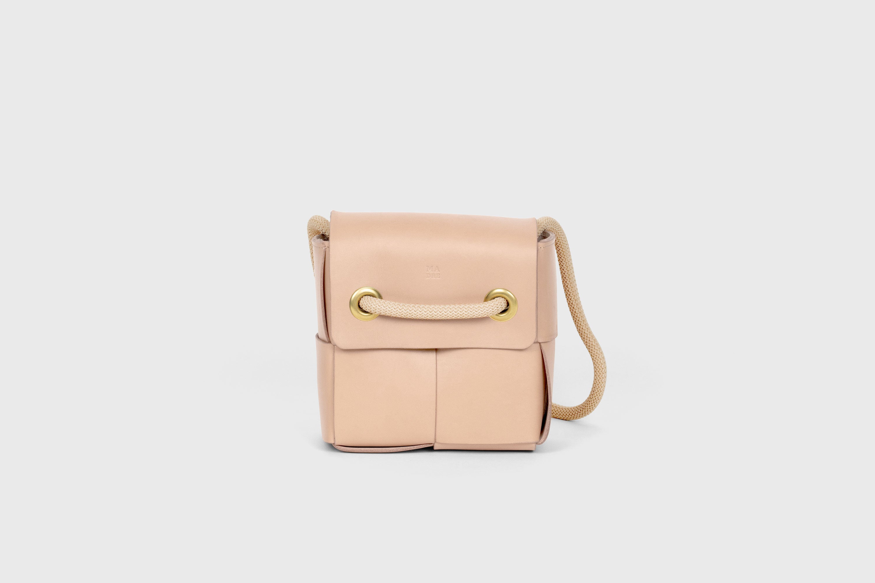 Elegant Atelier Madre Natural Color woven leather backpack, designed by Manuel Dreesmann, showcasing exquisite craftsmanship and luxury style, crafted in the heart of Barcelona.