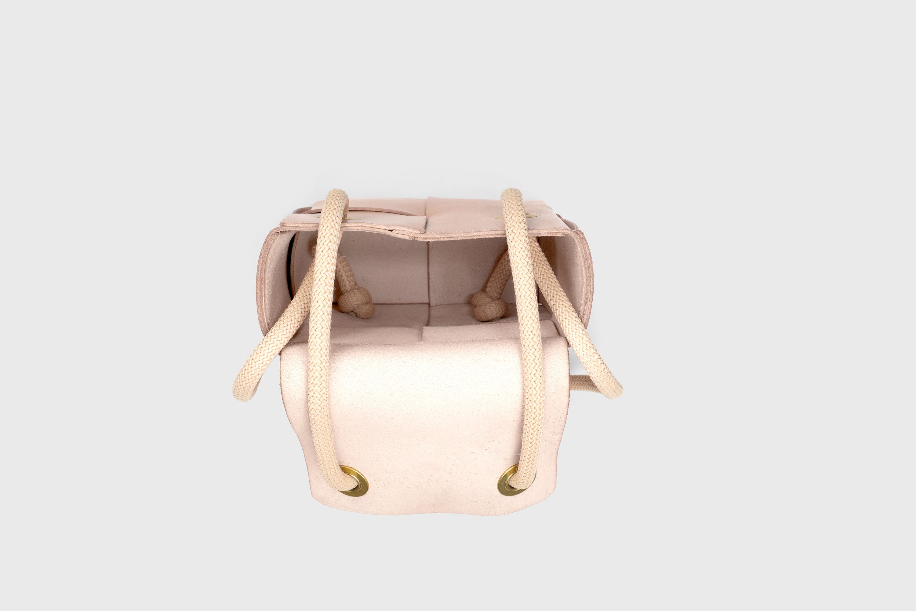 Elegant Atelier Madre Natural Color woven leather backpack, designed by Manuel Dreesmann, showcasing exquisite craftsmanship and luxury style, crafted in the heart of Barcelona.