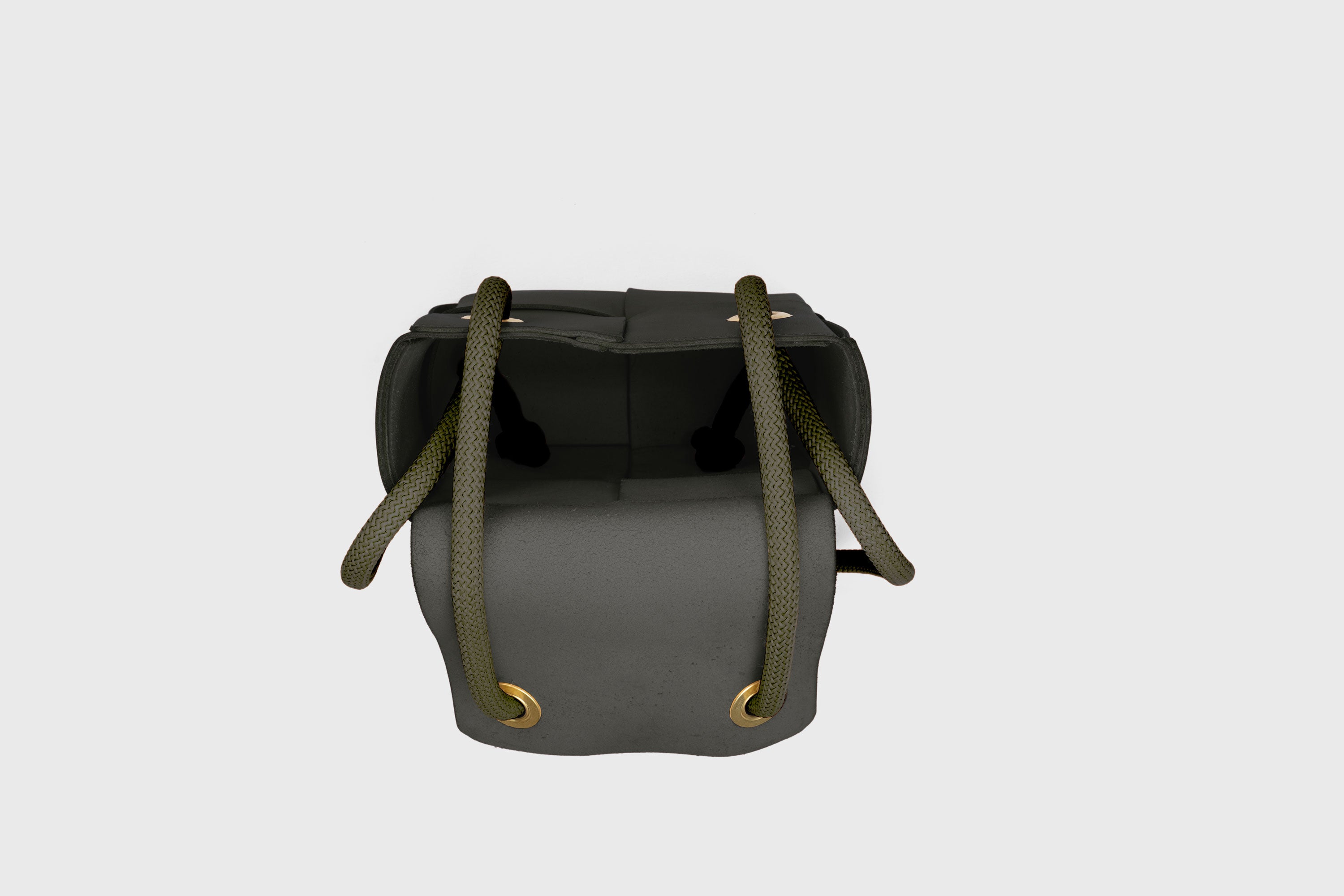 Elegant Atelier Madre Olive Green Color woven leather backpack, designed by Manuel Dreesmann, showcasing exquisite craftsmanship and luxury style, crafted in the heart of Barcelona.