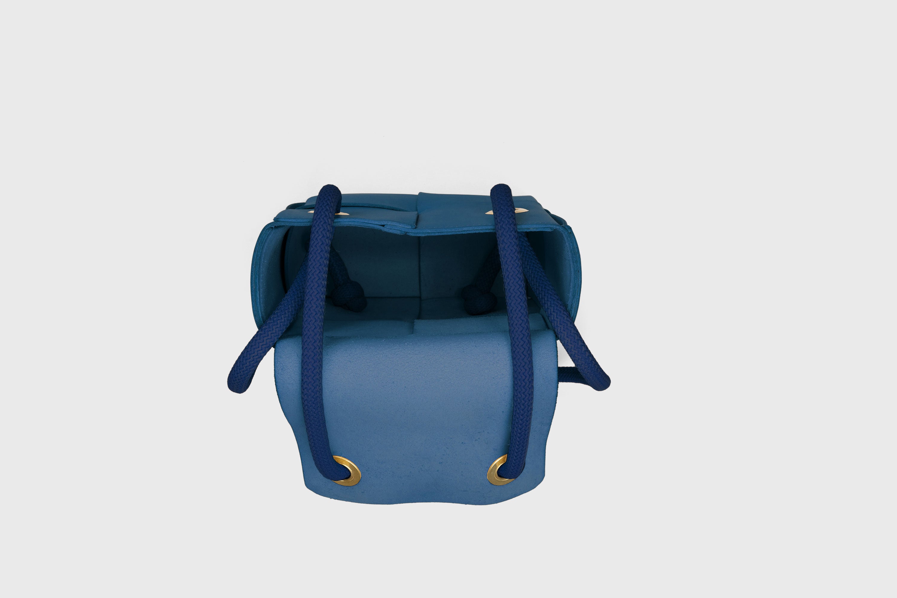 Elegant Atelier Madre Royal Blue Color woven leather backpack, designed by Manuel Dreesmann, showcasing exquisite craftsmanship and luxury style, crafted in the heart of Barcelona.