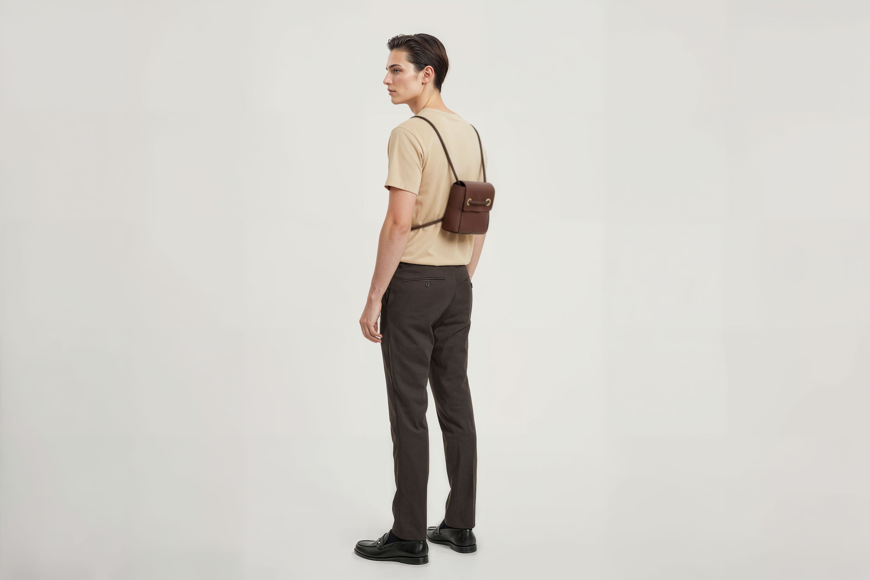 Woven Backpack Small Dark Brown Leather On Model Minimalistic Design Atelier Madre Manuel Dreesmann Barcelona
