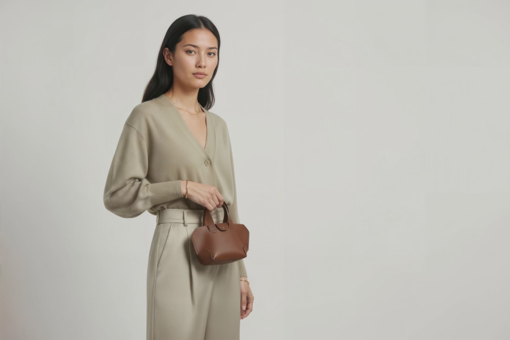 Nano Leather Tote Bag Dark Brown Color On A Woman Model Premium Quality Minimalist Design Atelier Madre Manuel Dreesmann Barcelona Spain