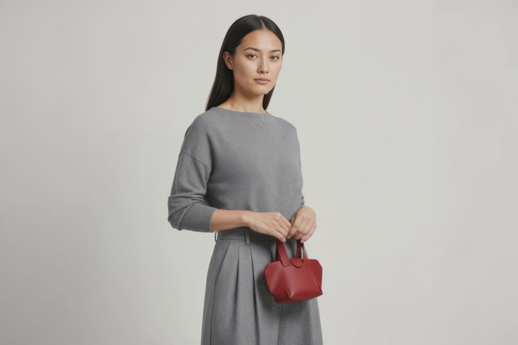 Nano Leather Tote Bag Red Color On A Woman Model Premium Quality Minimalist Design Atelier Madre Manuel Dreesmann Barcelona Spain
