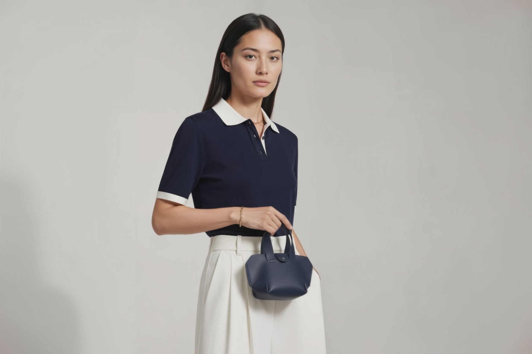 Nano Leather Tote Bag Marine Blue Color On A Woman Model Premium Quality Minimalist Design Atelier Madre Manuel Dreesmann Barcelona Spain