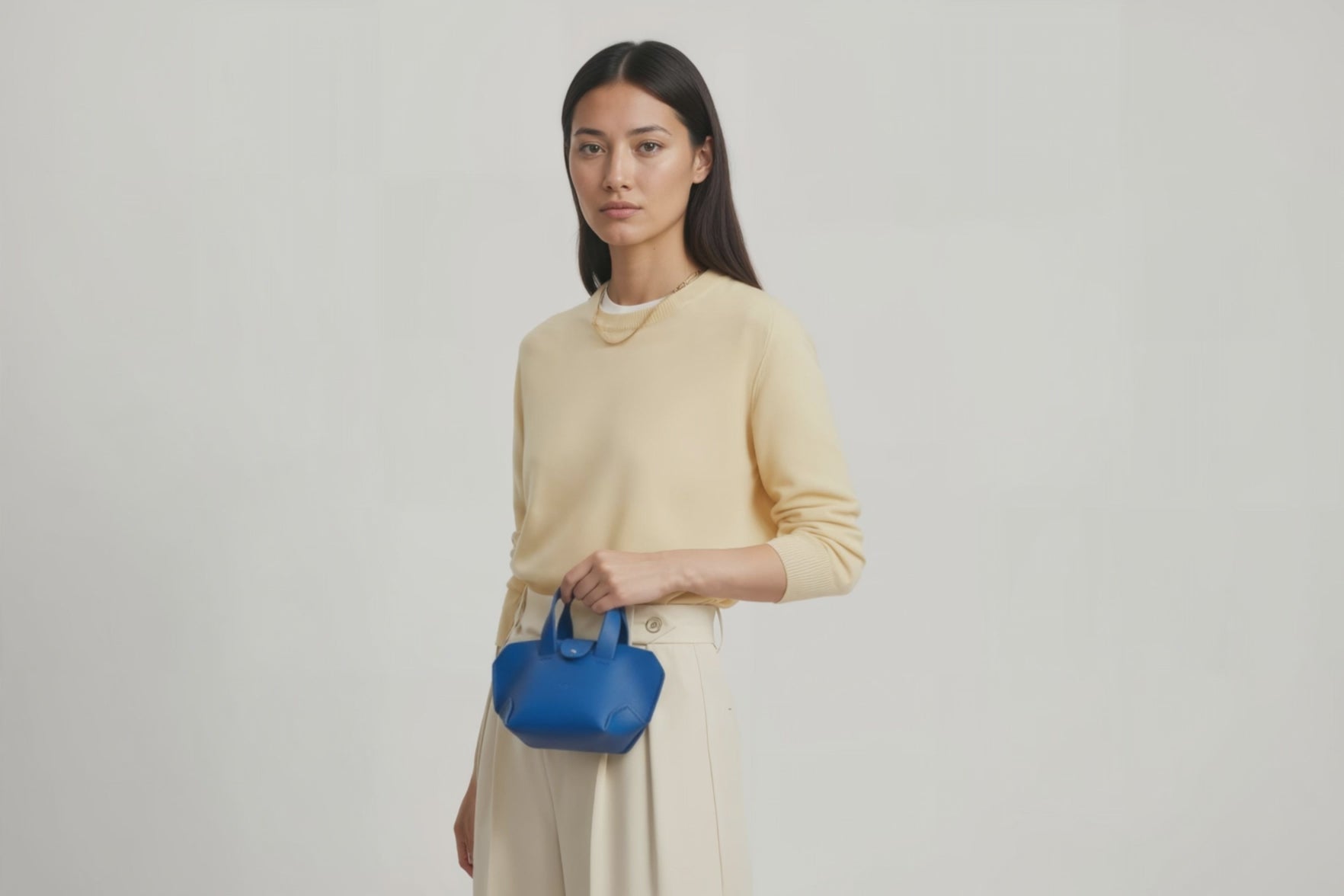 Nano Leather Tote Bag Royal Blue Color On A Woman Model Premium Quality Minimalist Design Atelier Madre Manuel Dreesmann Barcelona Spain
