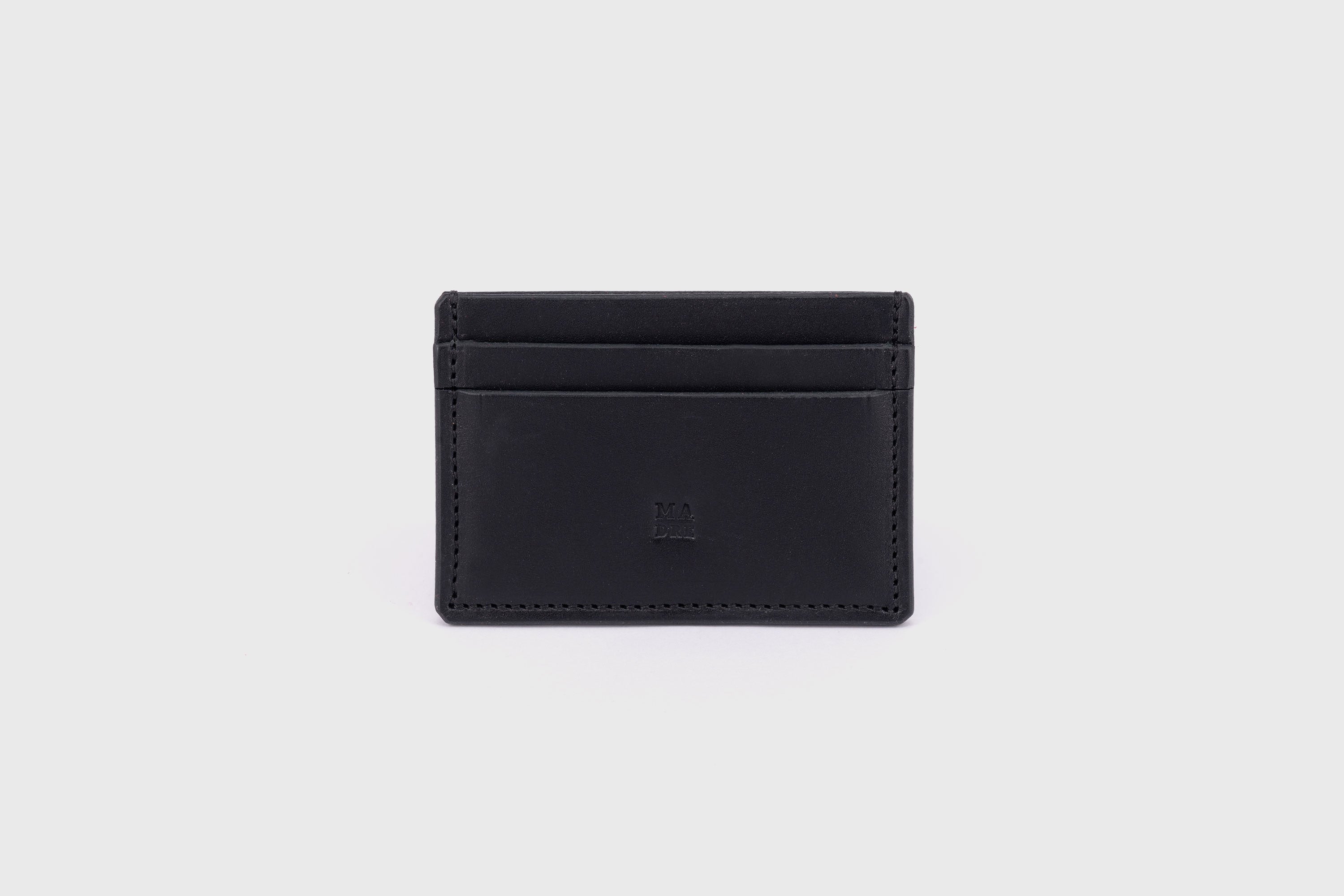 Credit Card Wallet in Black Leather Vachetta Vegetable Tanned Leather Handmade and Modern Design by Atelier Madre Manuel Dreesmann Barcelona Spain