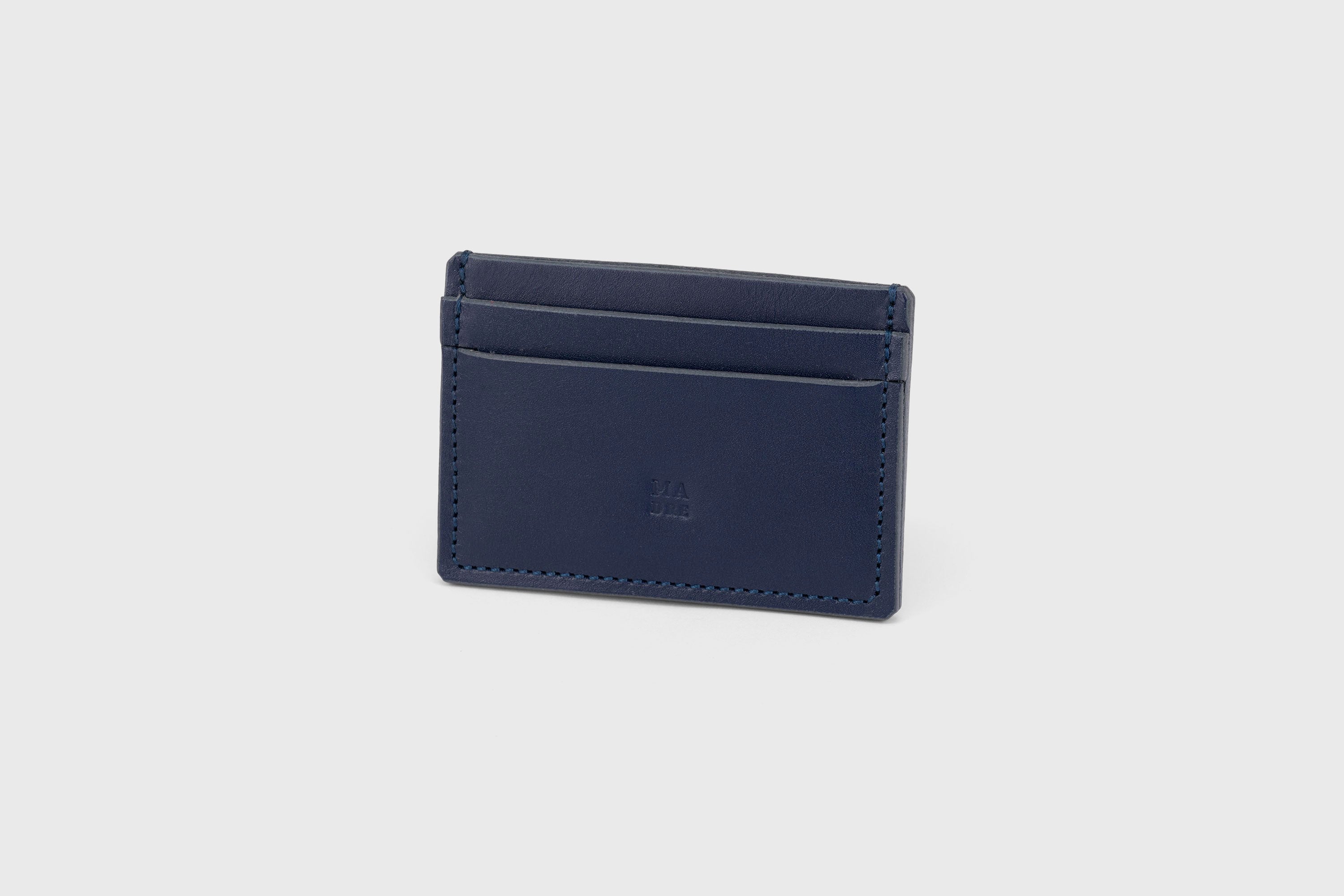 Credit Card Wallet in Marine Blue Leather Vachetta Vegetable Tanned Leather Novillo Handmade and Design by Atelier Madre Manuel Dreesmann Barcelona Spain