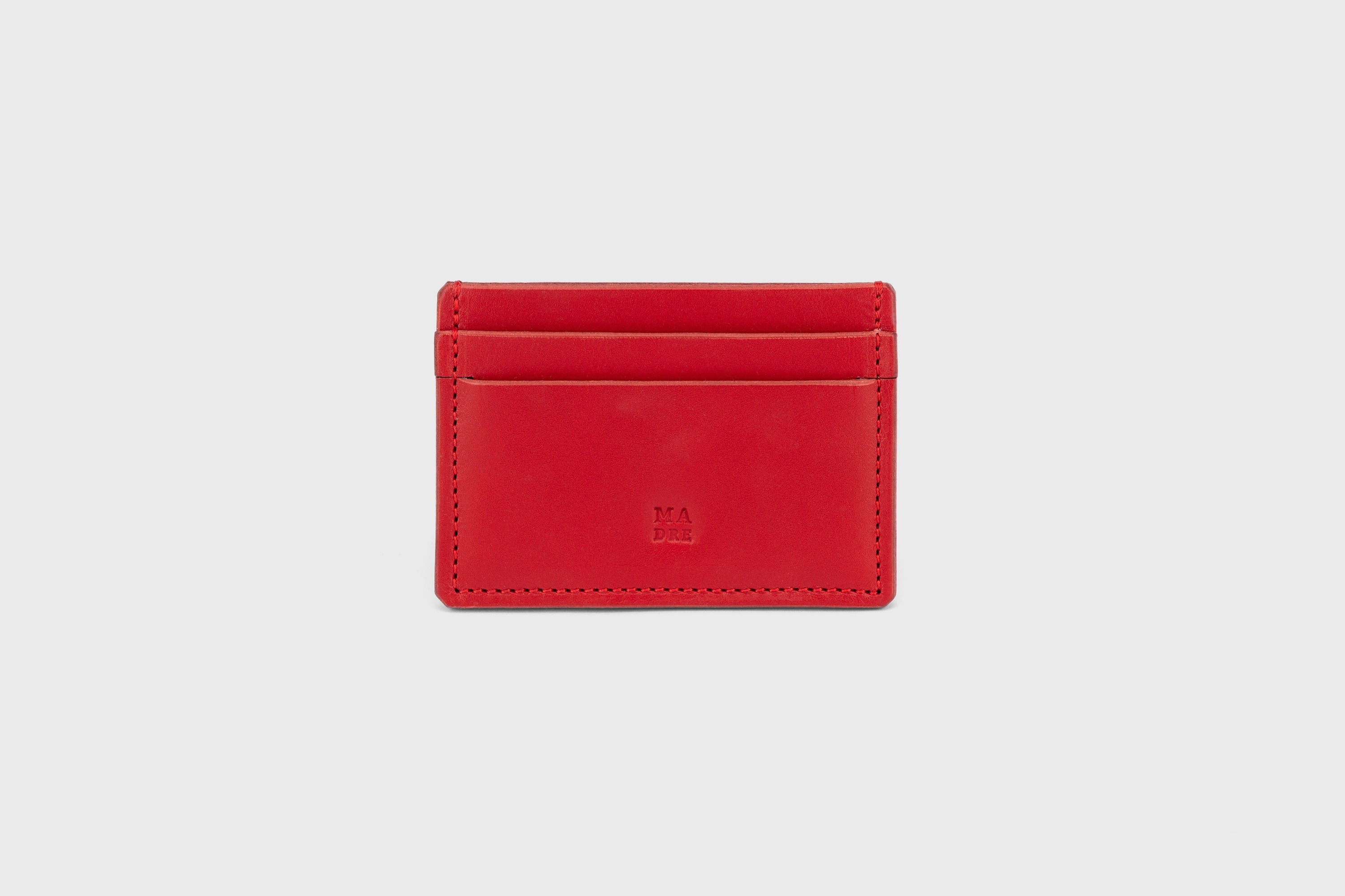 Credit Card Wallet in Red Leather Vachetta Vegetable Tanned Leather Handmade and Sleek Design by Atelier Madre Manuel Dreesmann Barcelona Spain