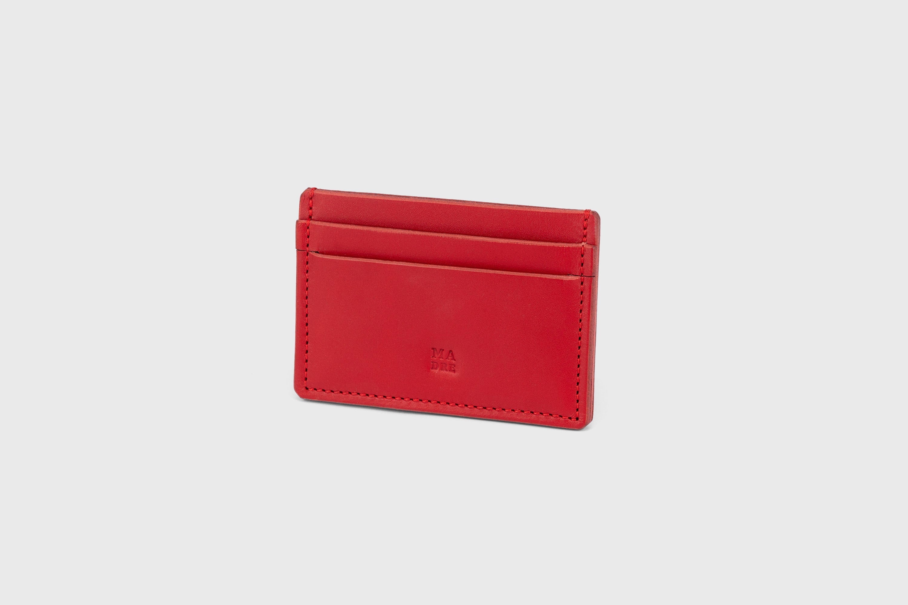 Credit Card Wallet in Red Leather Vachetta Vegetable Tanned Leather Handmade and Designed by Atelier Madre Manuel Dreesmann Barcelona Spain