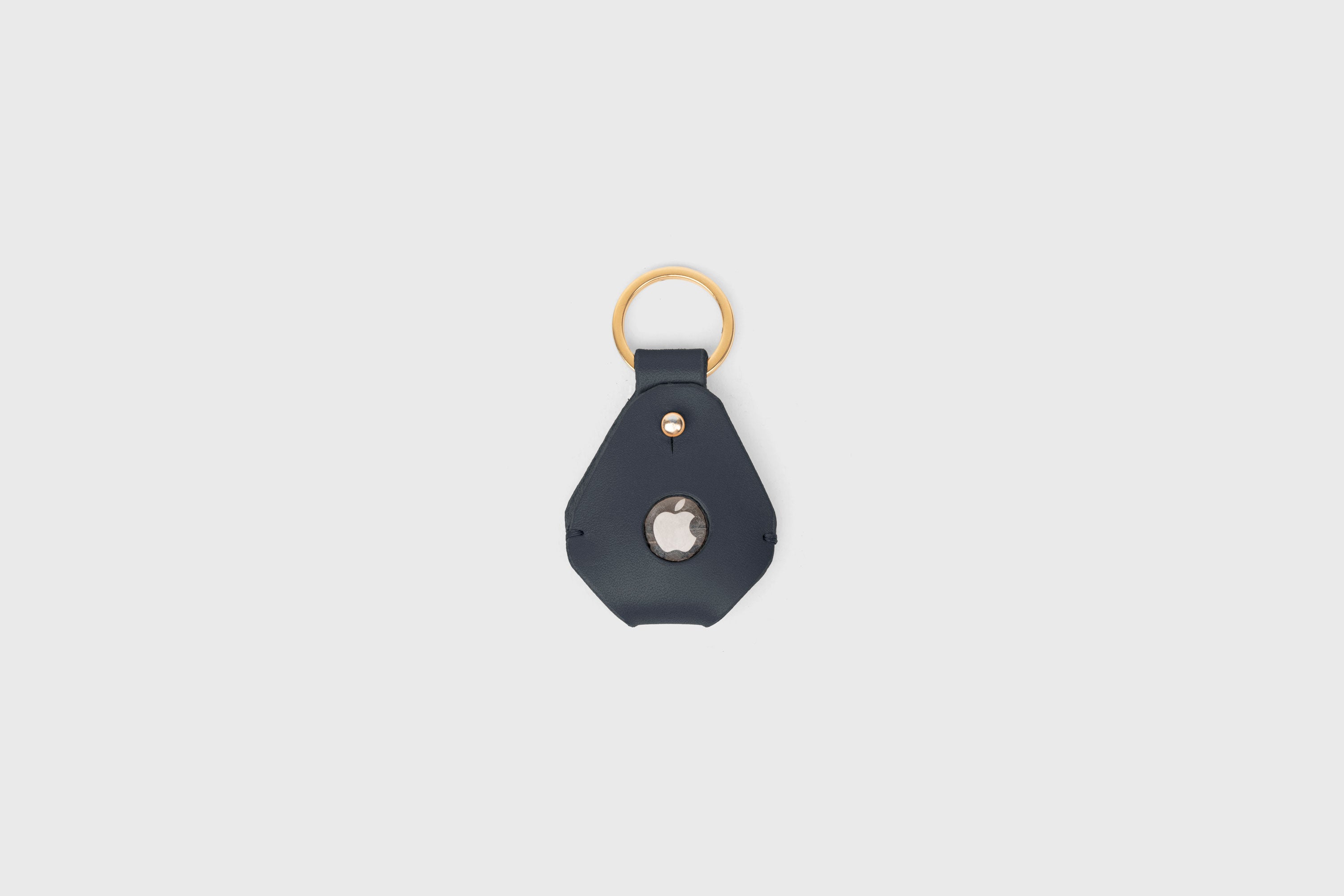 Airtag Key Ring In Marine Blue Color In Vegetable Tanned Leather Minimalistic Design Atelier Madre Manuel Dreesmann Barcelona Spain