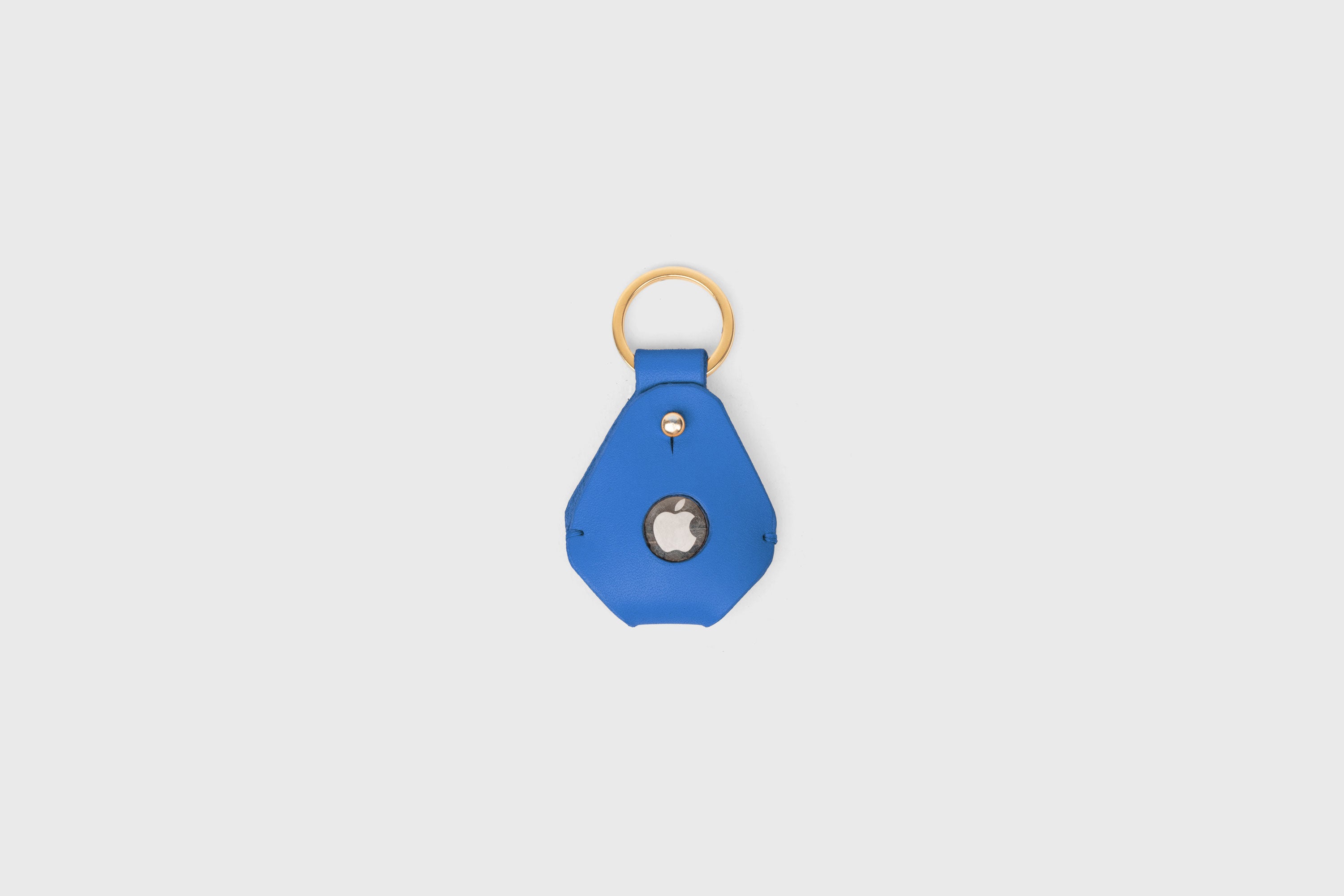Airtag Key Ring In Royal Blue Color In Vegetable Tanned Leather Minimalistic Design Atelier Madre Manuel Dreesmann Barcelona Spain