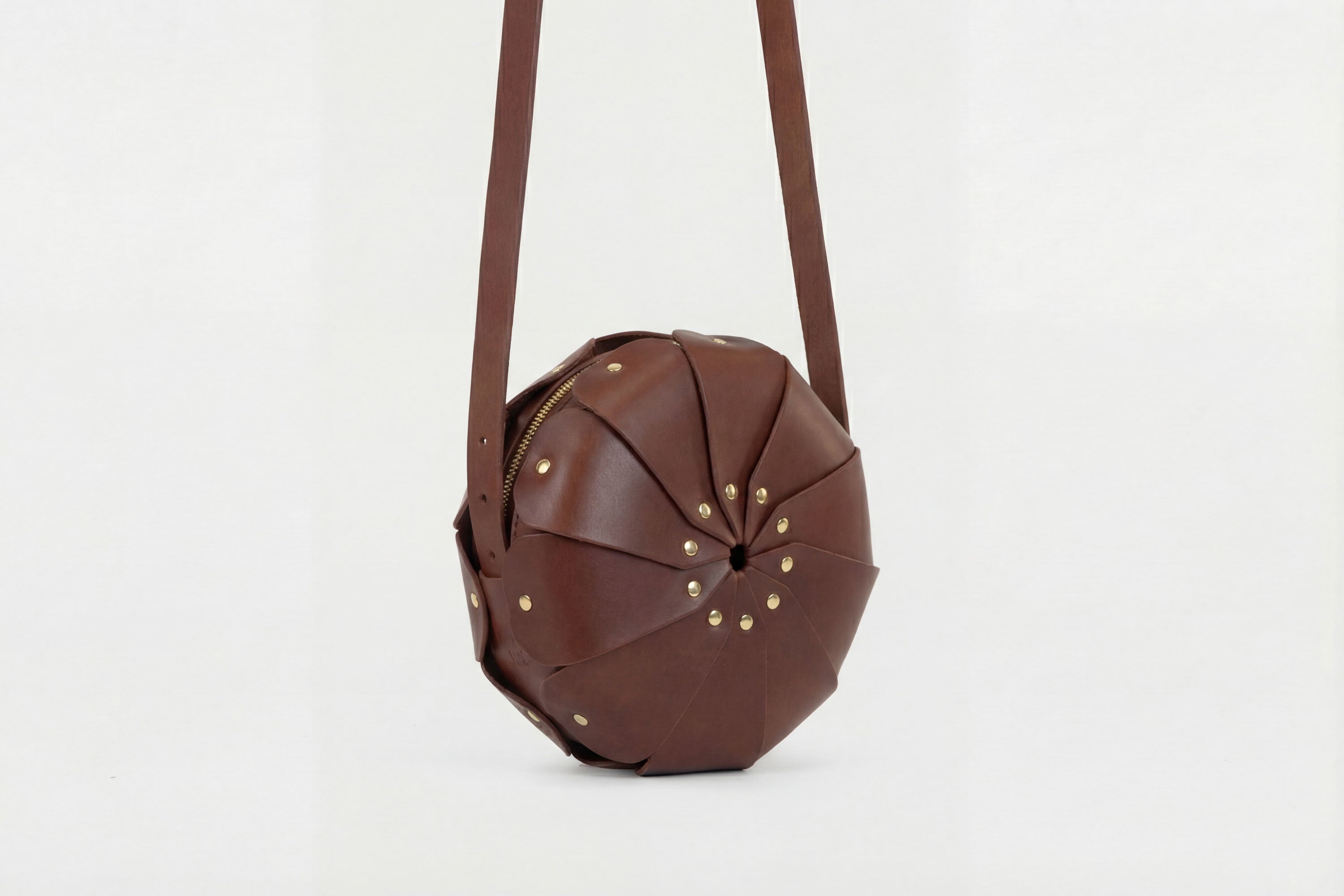 Anemo Leather Bag Dark Brown Color Floral Design Premium Minimalist Modern Circle Round Pouch Crossbody Atelier Madre Manuel Dreesmann Barcelona Spain