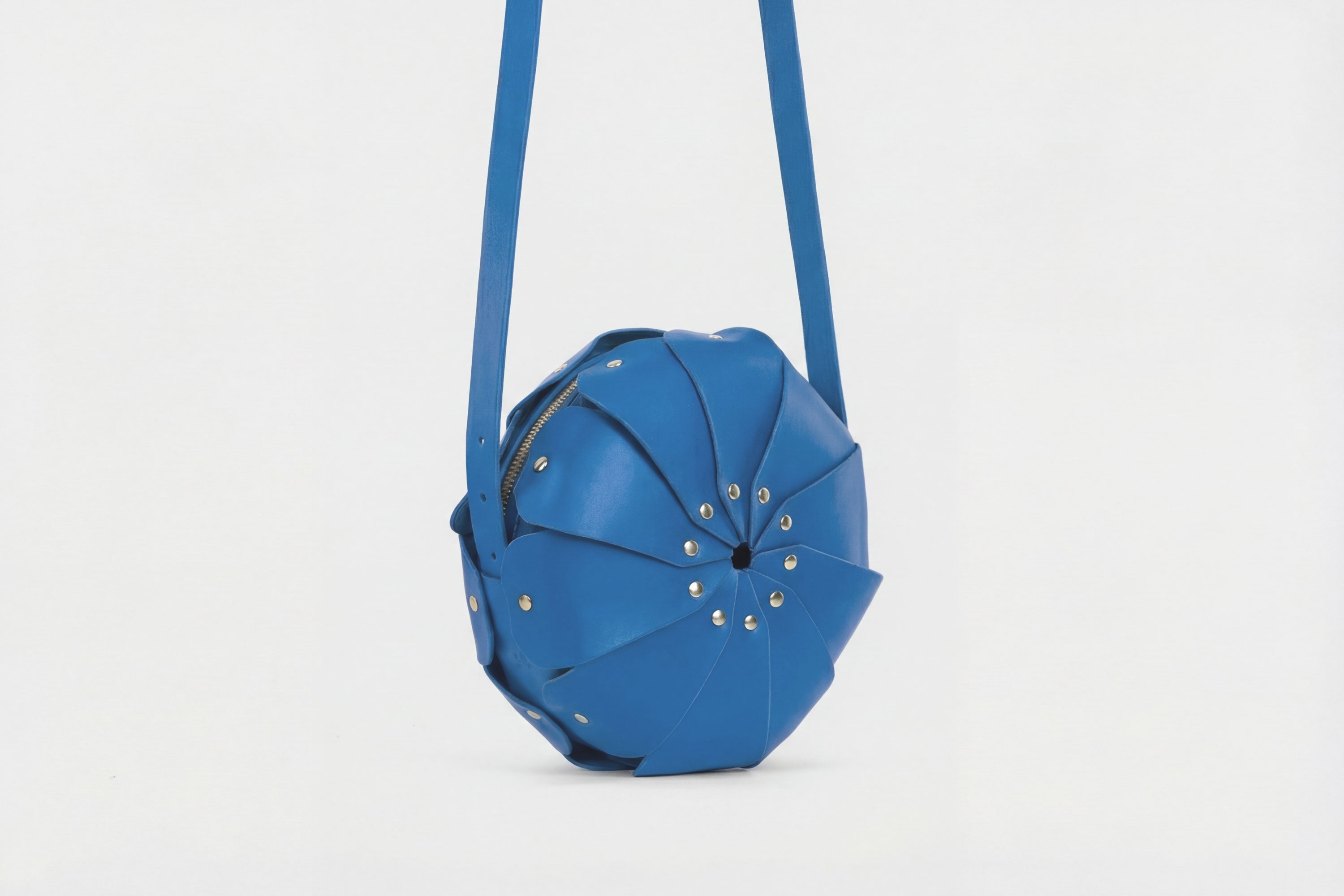 Anemo Leather Bag Royal Blue Color Floral Design Premium Minimalist Modern Circle Round Pouch Crossbody Atelier Madre Manuel Dreesmann Barcelona Spain
