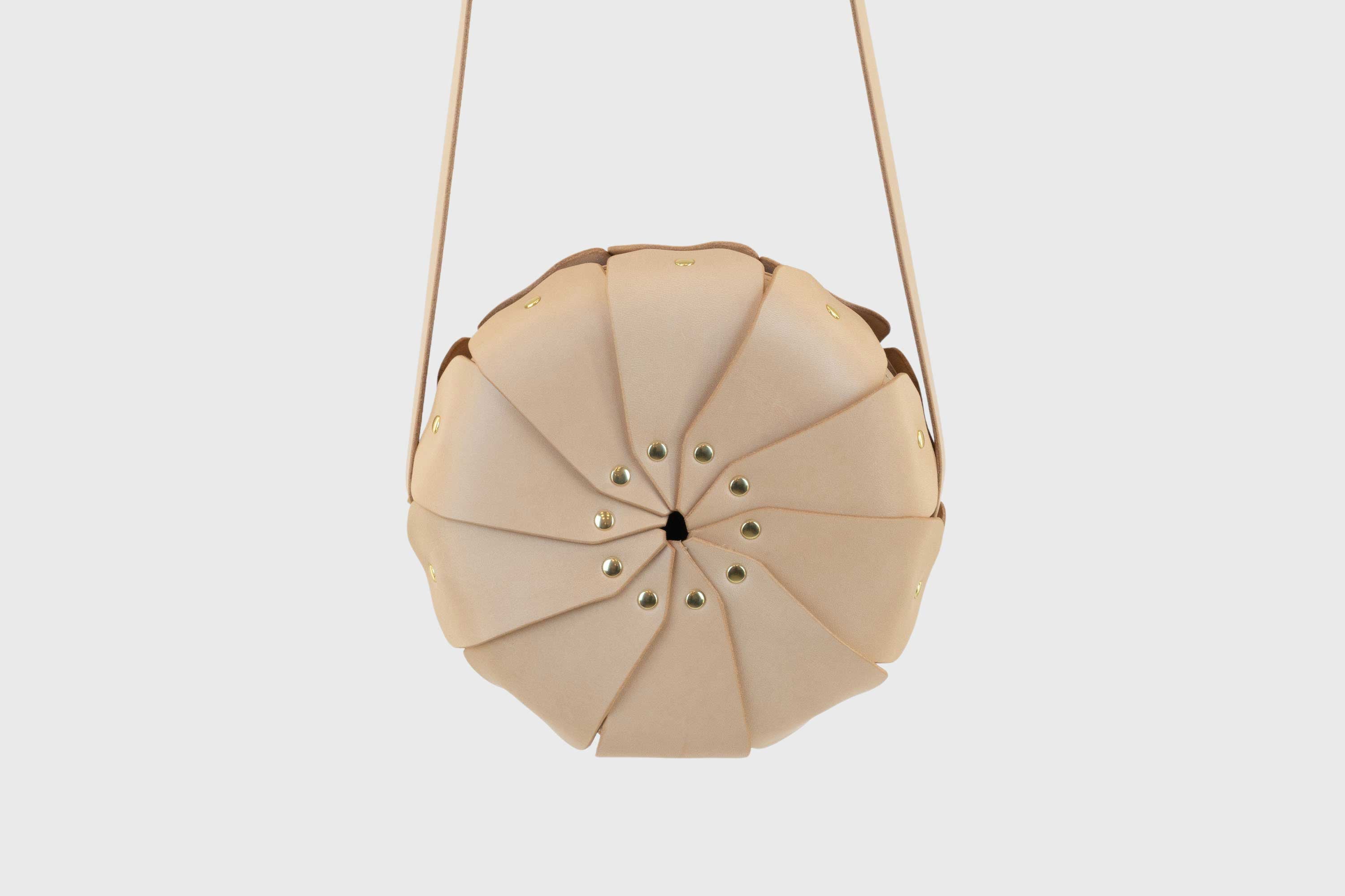 Anemo Leather Bag Front Natural Color Floral Design Premium Minimalist Modern Circle Round Pouch Crossbody Atelier Madre Manuel Dreesmann Barcelona