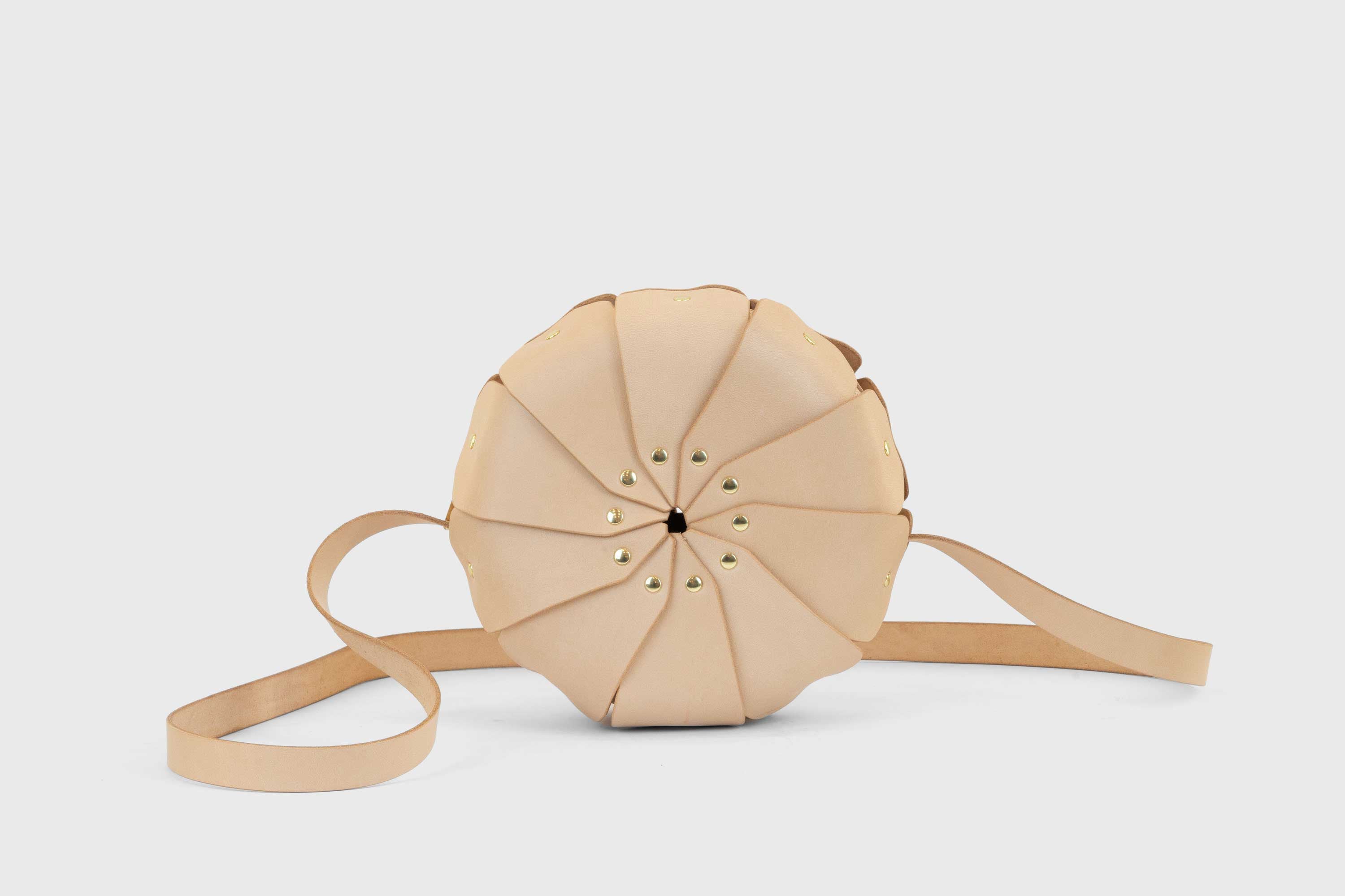 Anemo Leather Bag Front Natural Color Floral Design Premium Minimalist Modern Circle Round Pouch Crossbody Atelier Madre Manuel Dreesmann Barcelona