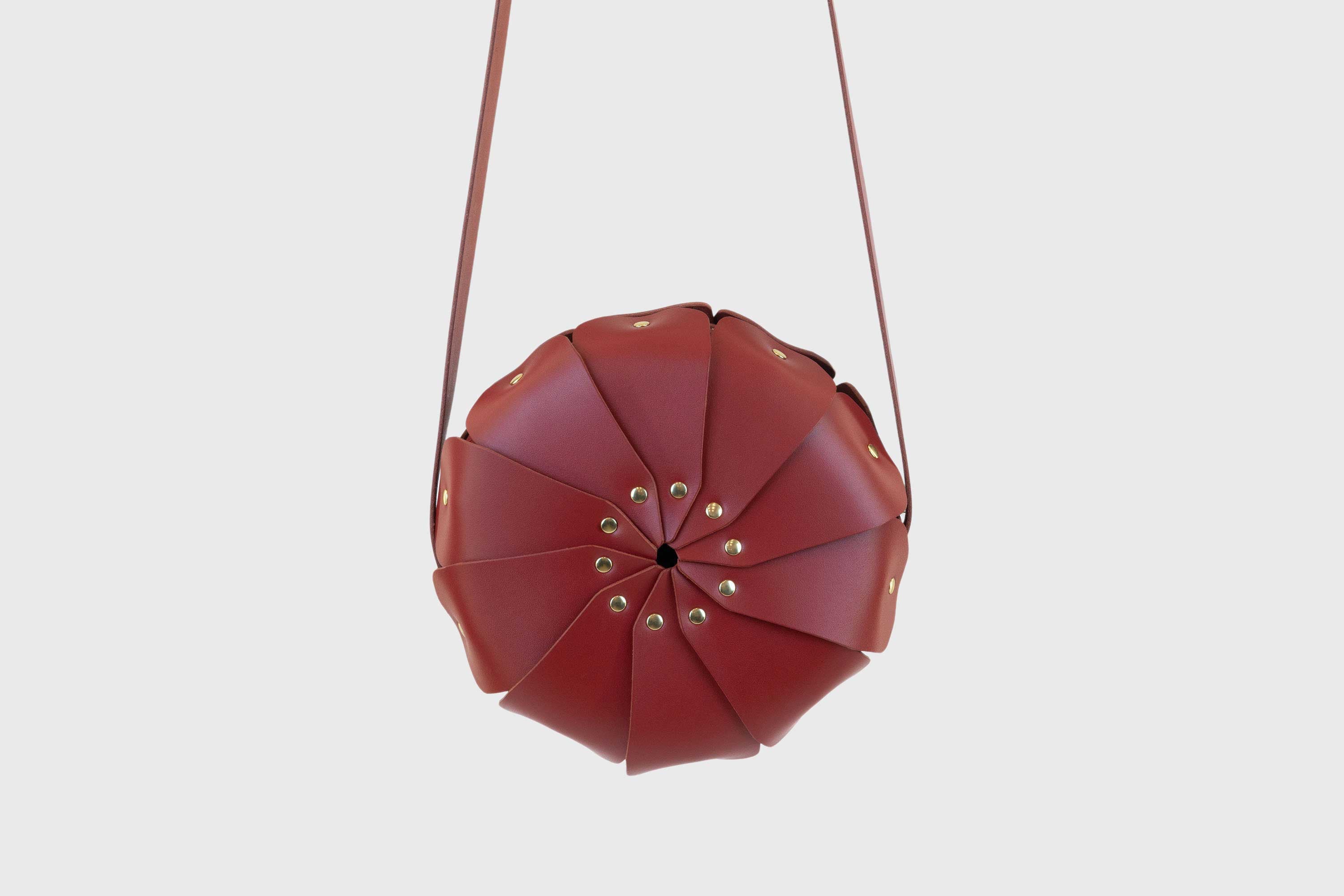 Anemo Leather Bag Front Red Color Floral Design Premium Minimalist Modern Circle Round Pouch Crossbody Atelier Madre Manuel Dreesmann Barcelona