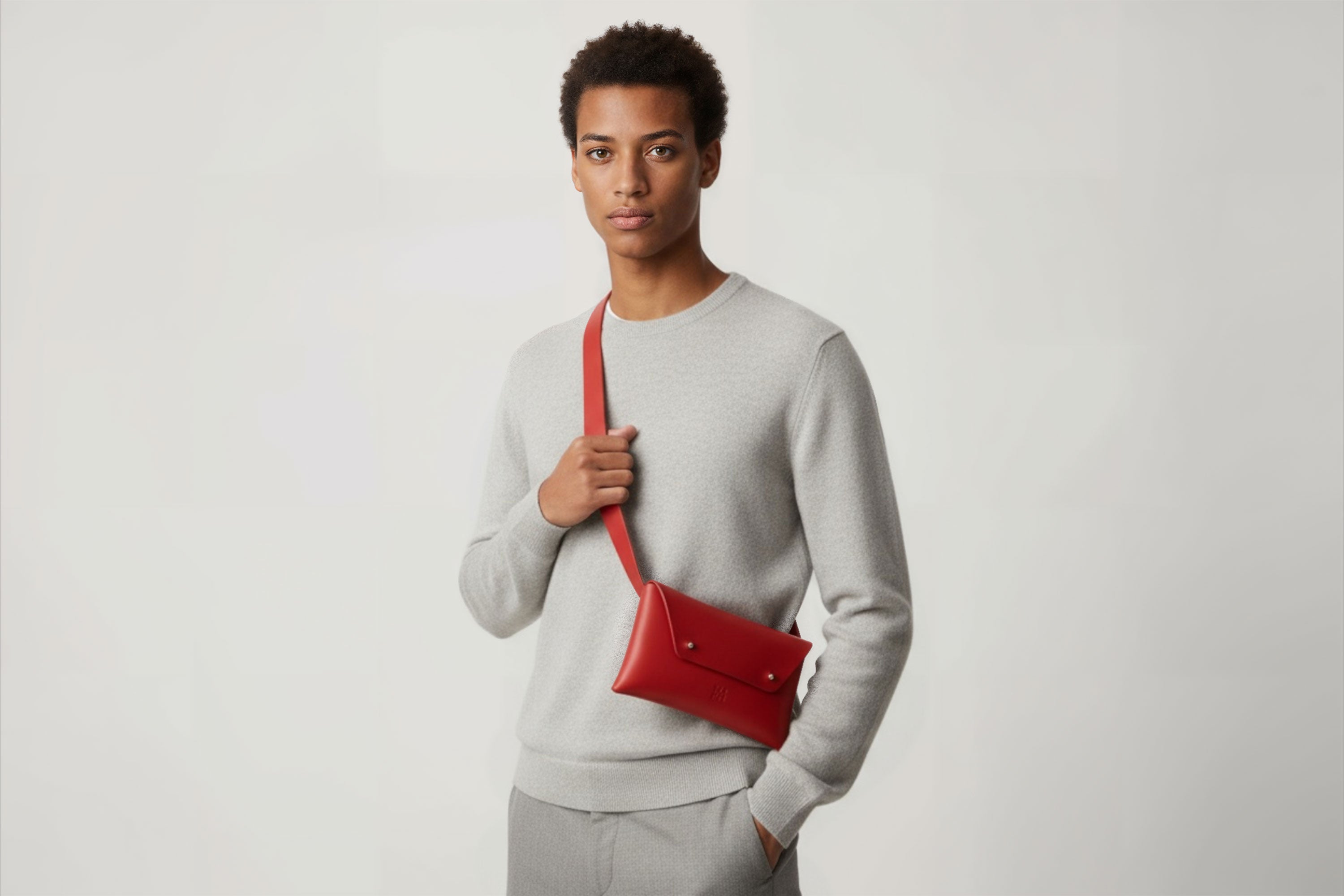 Belt Bag Leather Red Color On A Man Model Fanny Pack Waist Bag Vegetable Tanned Leather Full Grain Premium Quality Modern Minimalist Design Atelier Madre Manuel Dreesmann Barcelona Spain