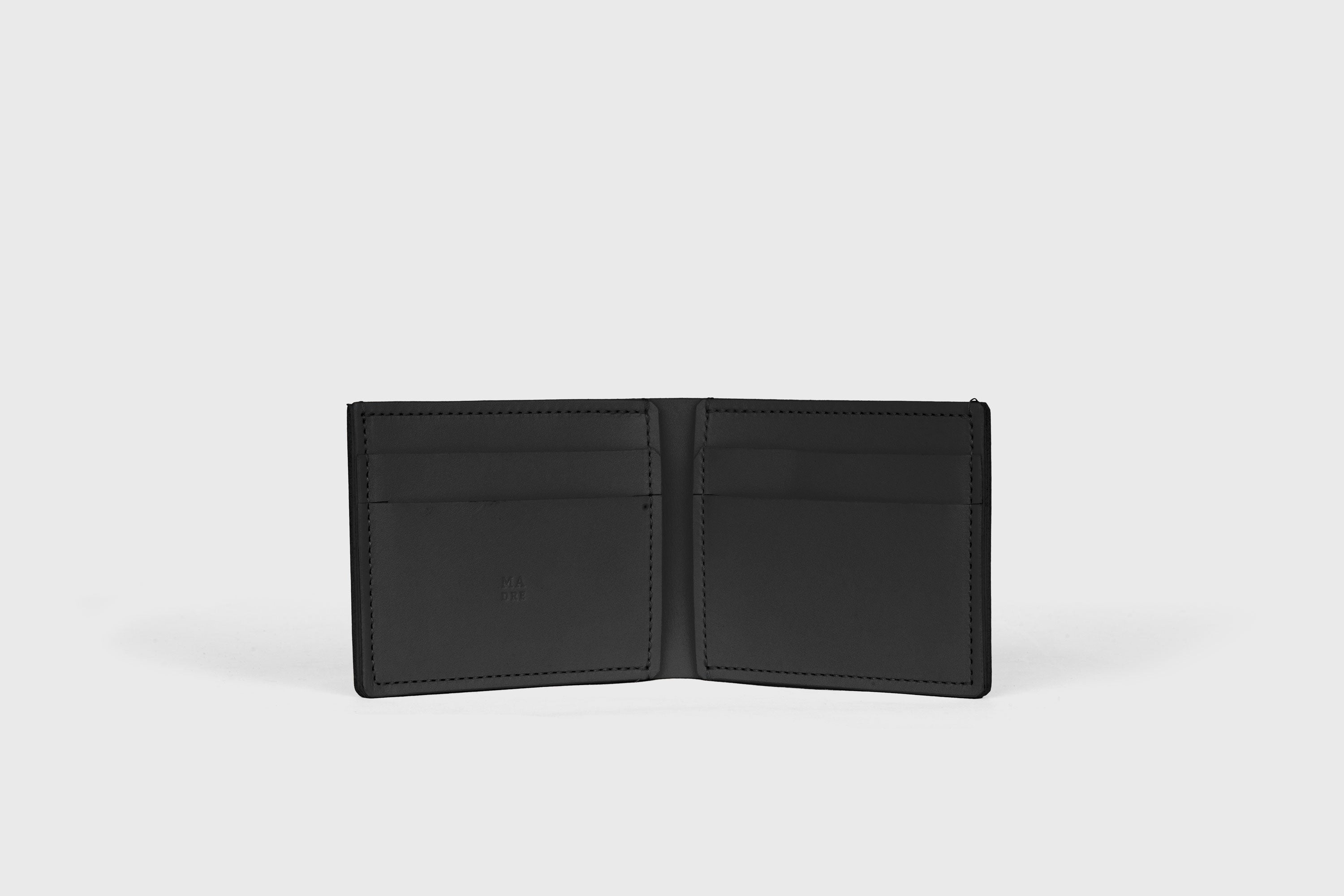 Bifold Wallet Horizontal With 6 Card Slots In Black Color In Vegetable Tanned Leather Minimalistic Design Atelier Madre Manuel Dreesmann Barcelona Spain